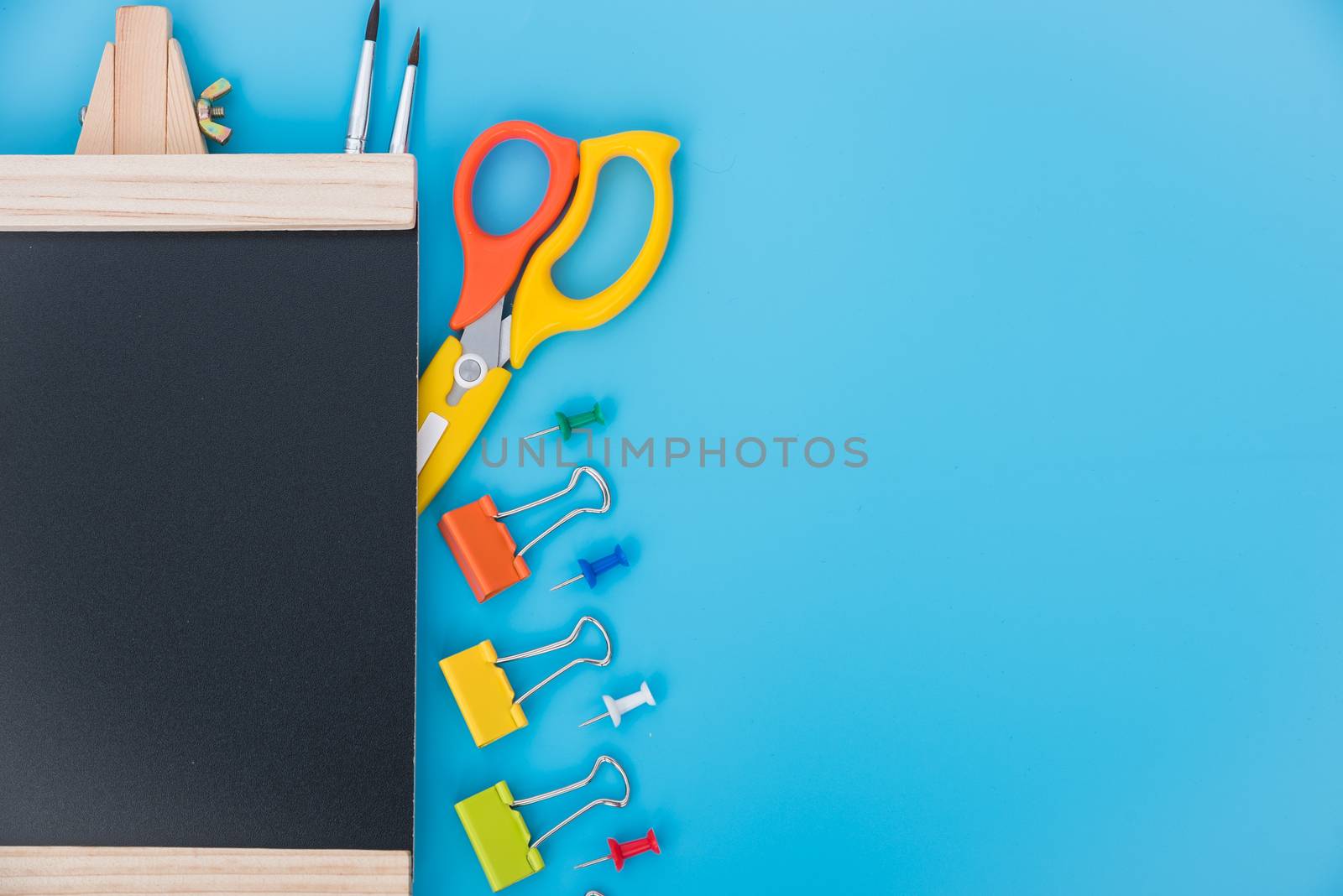 Top view tool set for education children on blue  background, back to school concept