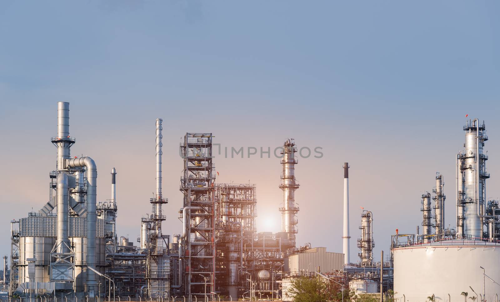 Oil Industry Refinery factory at Sunset, petrochemical plant, Petroleum