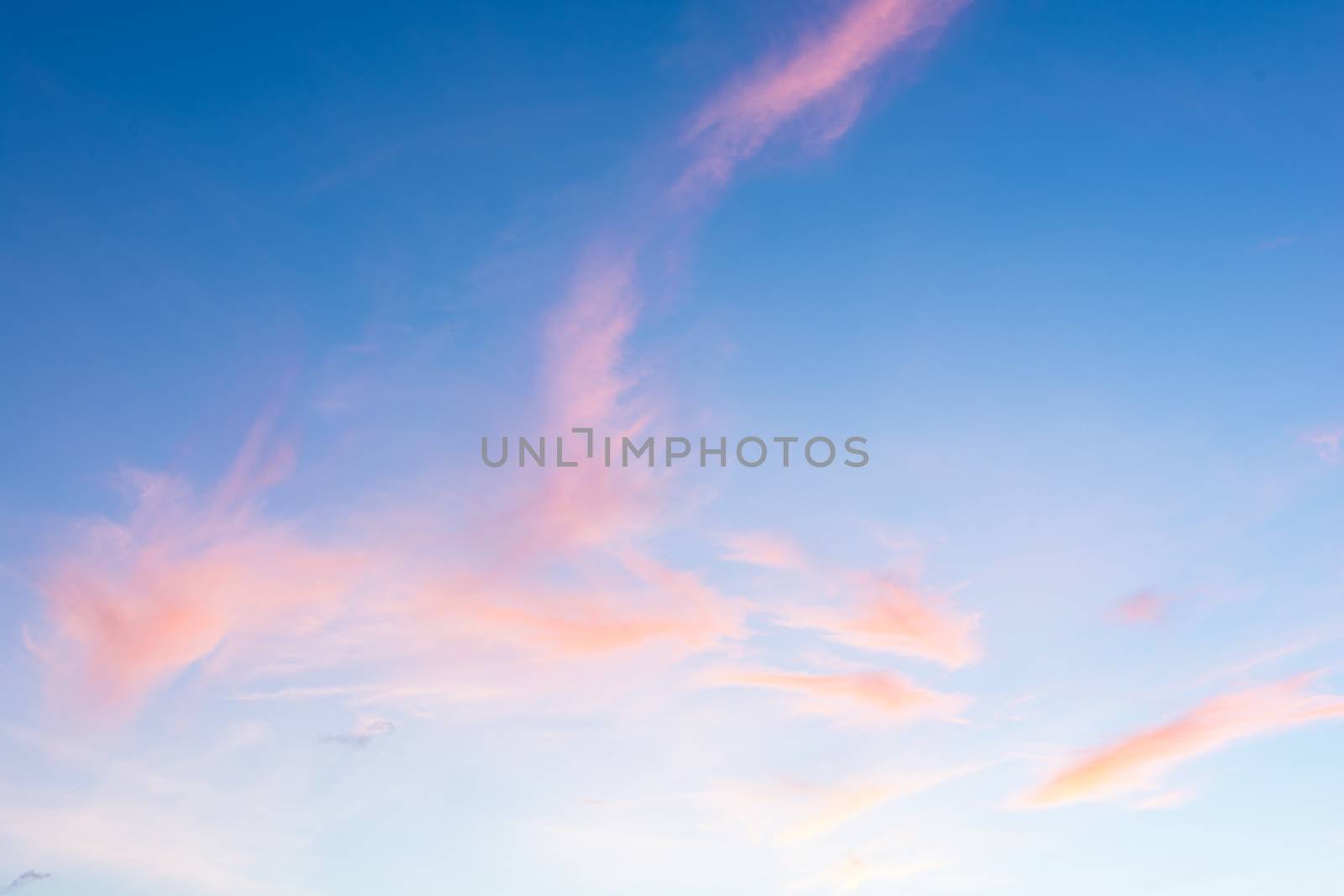 Sunset sky with colored clouds nature background