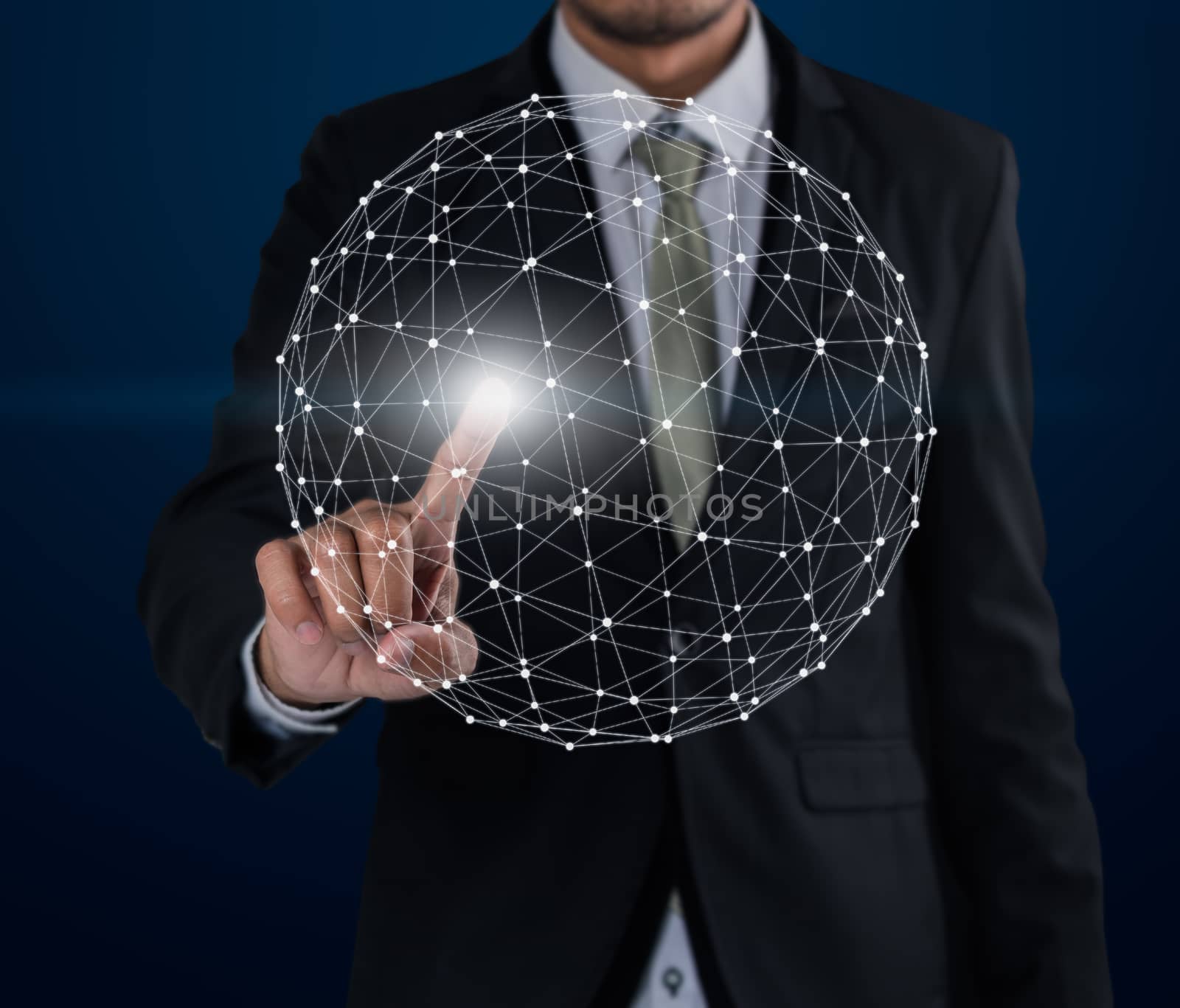 Business man touch networking technologies and social interaction on dark blue background