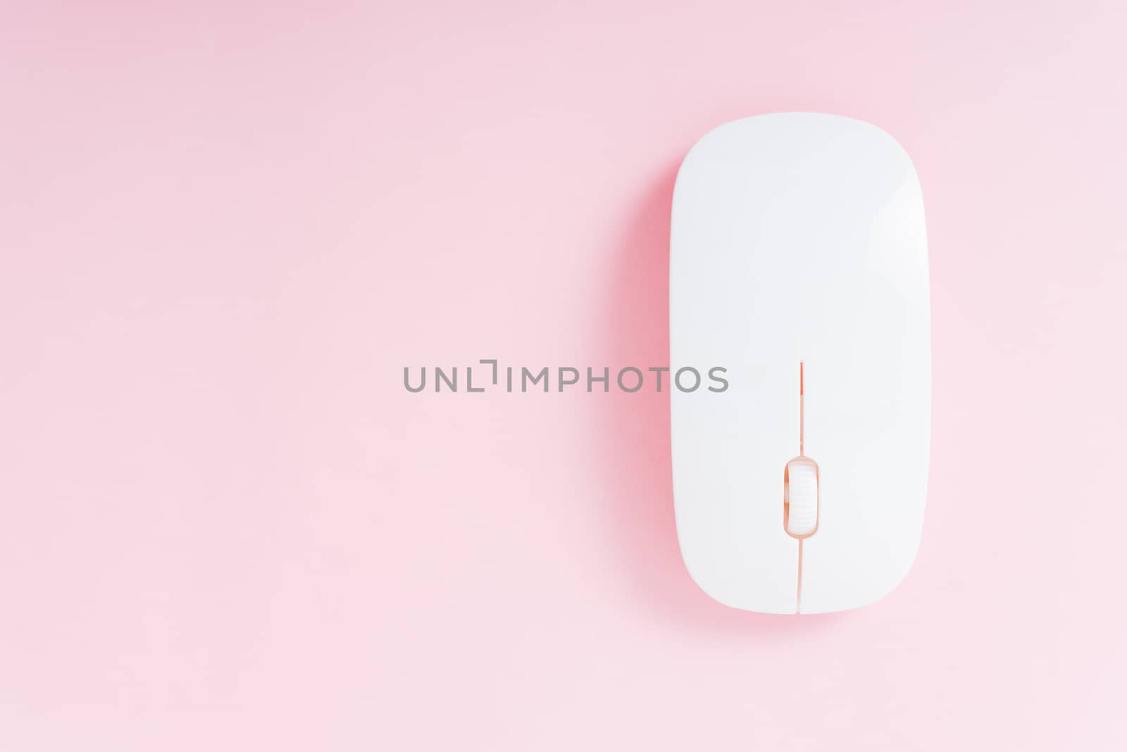 top view computer wireless mouse isolated on pink background