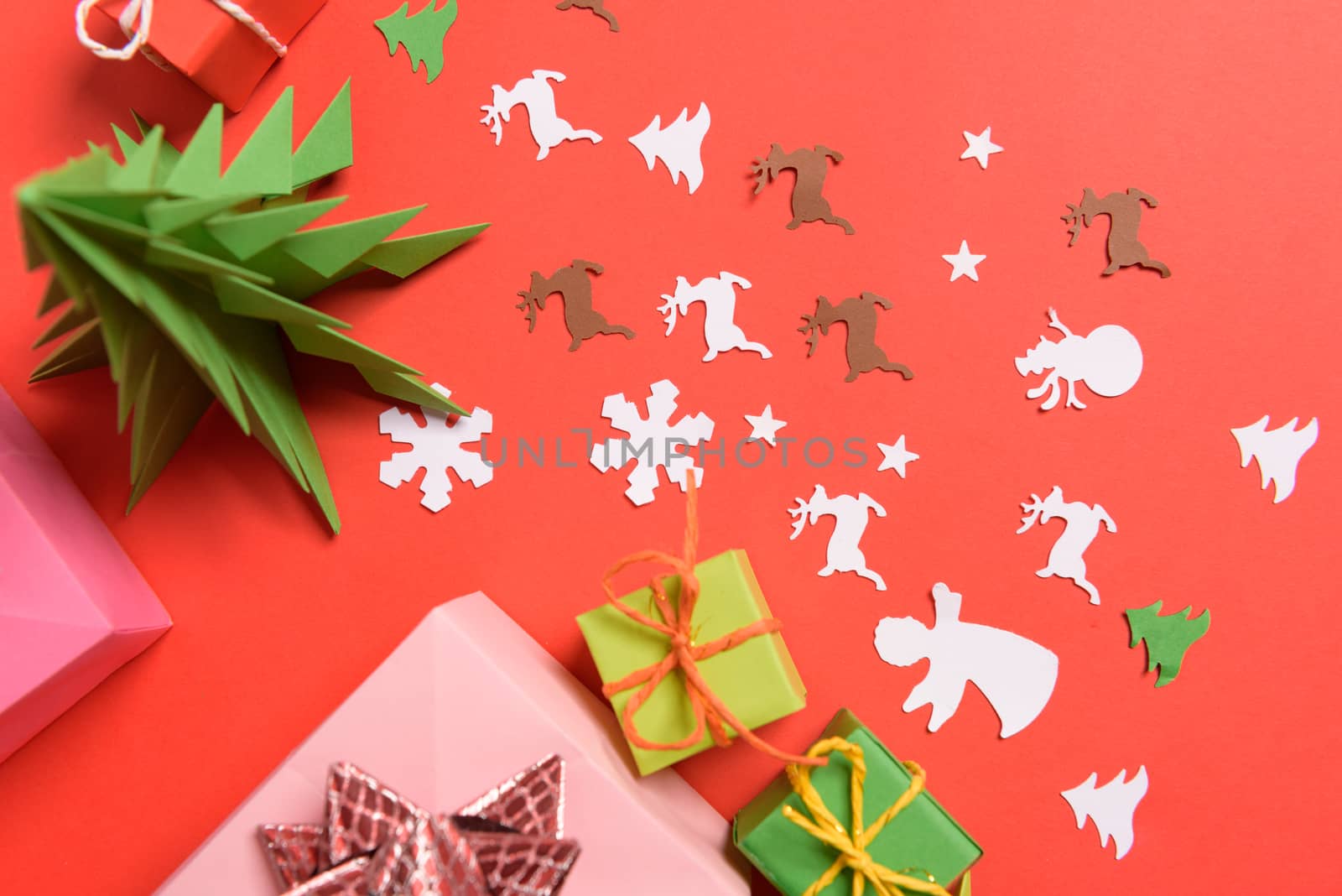 Christmas or New Year background, plain composition made of Xmas decorations and fir branches, flat lay, blank space for a greeting text.