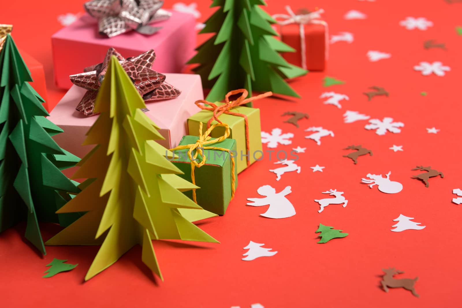 Christmas or New Year background, plain composition made of Xmas decorations and fir branches, flat lay, blank space for a greeting text.