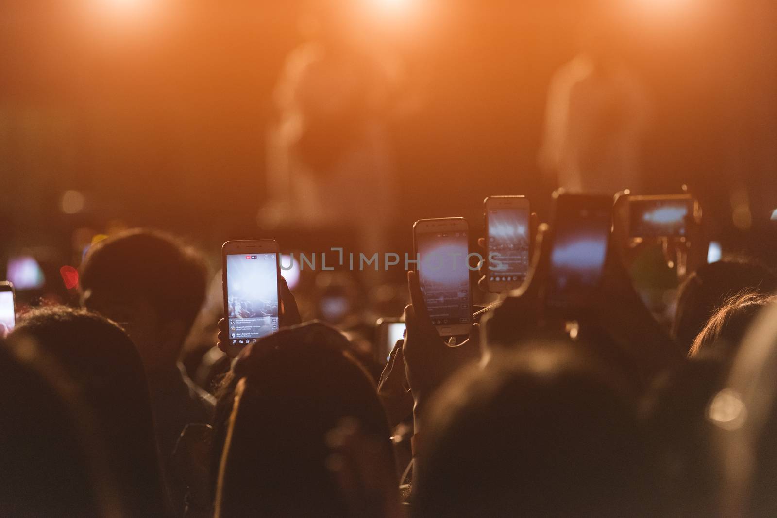 Event people live video festival music concert by hand holding smart mobile phone