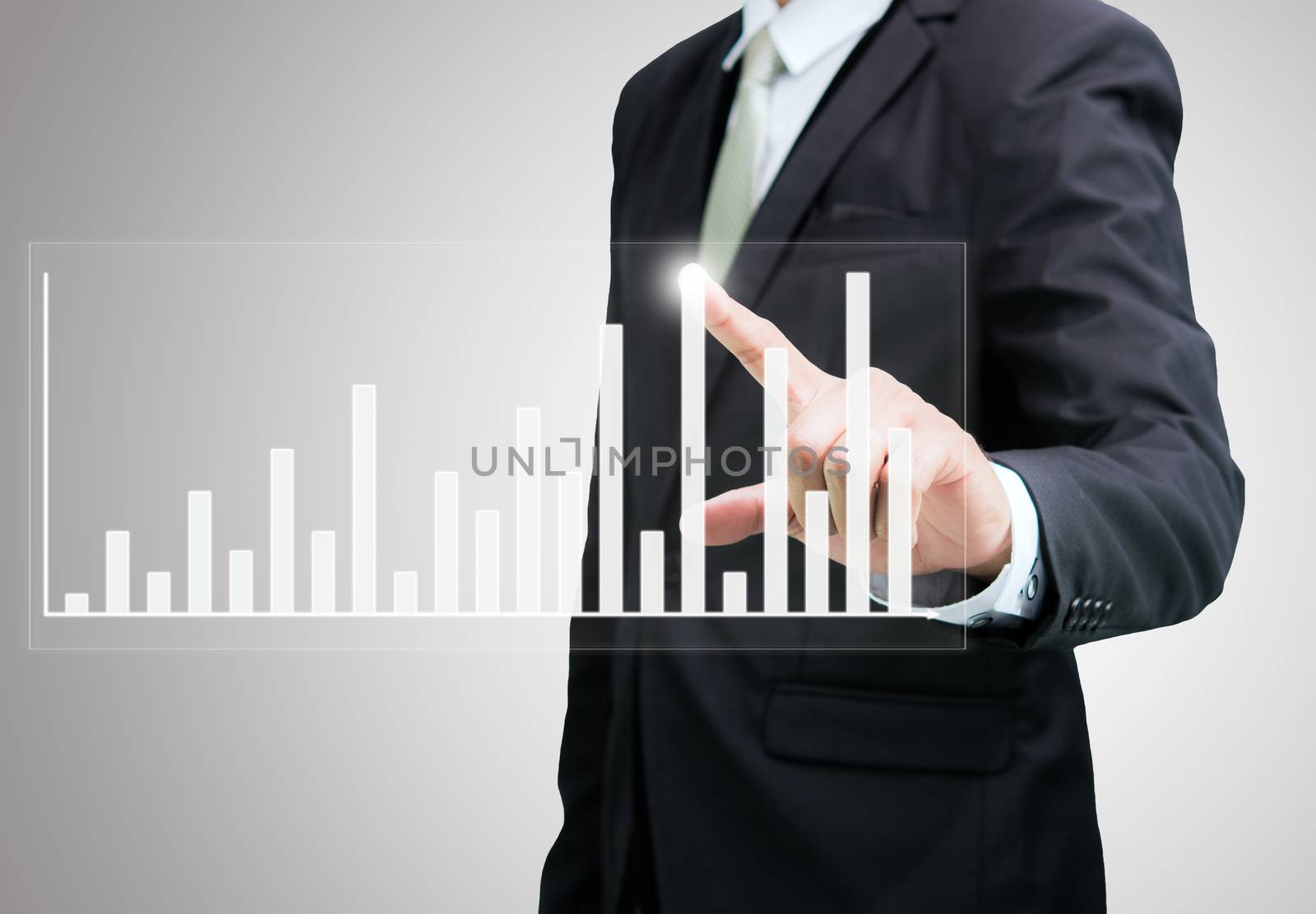 Businessman standing posture hand touch graph finance isolated on over gray background