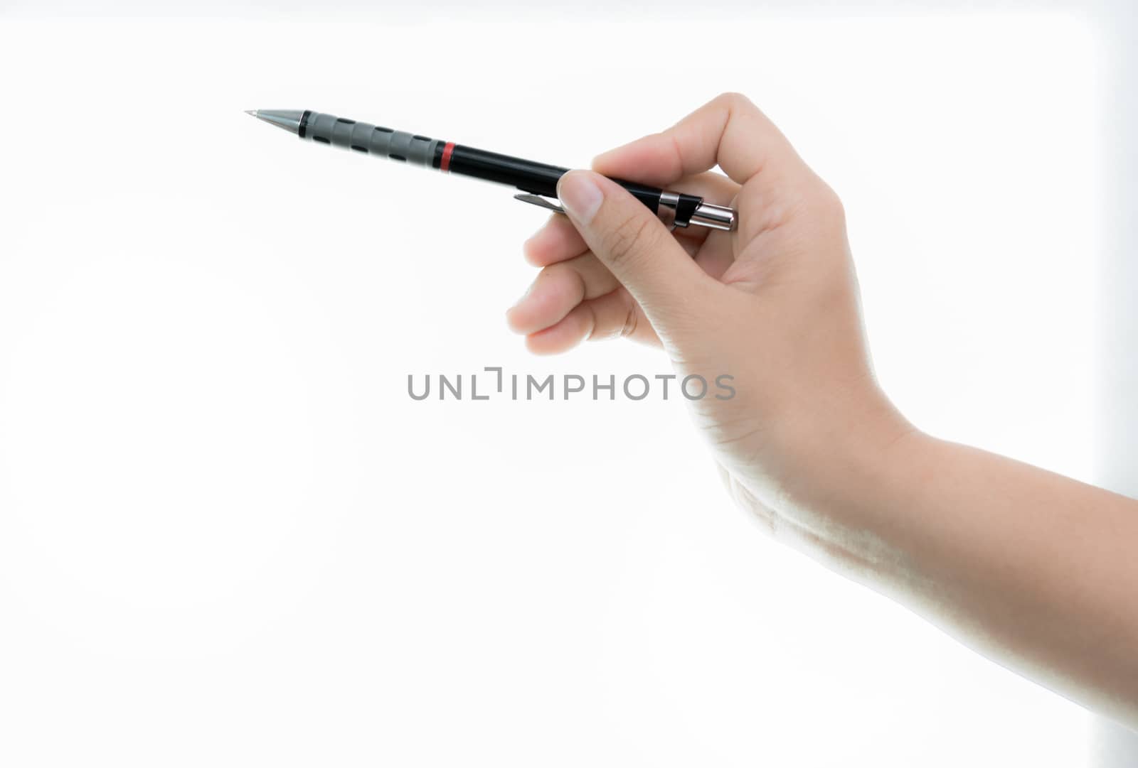 Hand is hold black pen ready for drawing Isolated by Sorapop