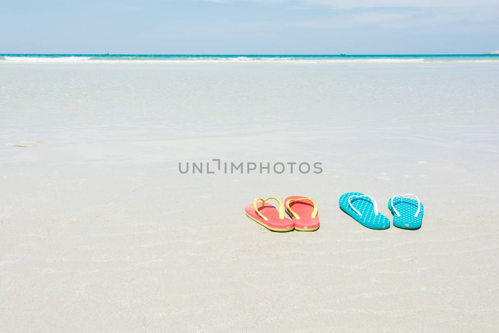 Beach, slippers on tropical beach by Sorapop