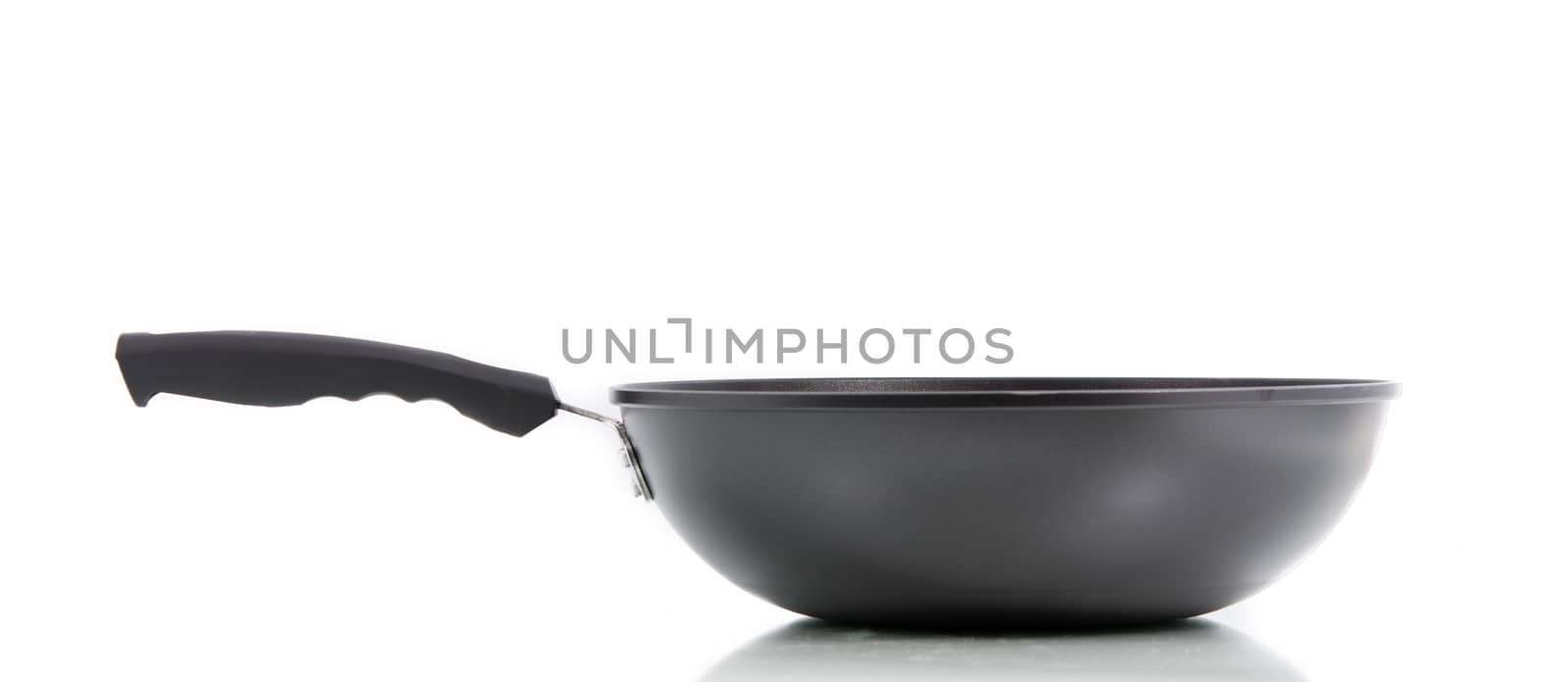 Closeup black frying pan isolated by Sorapop