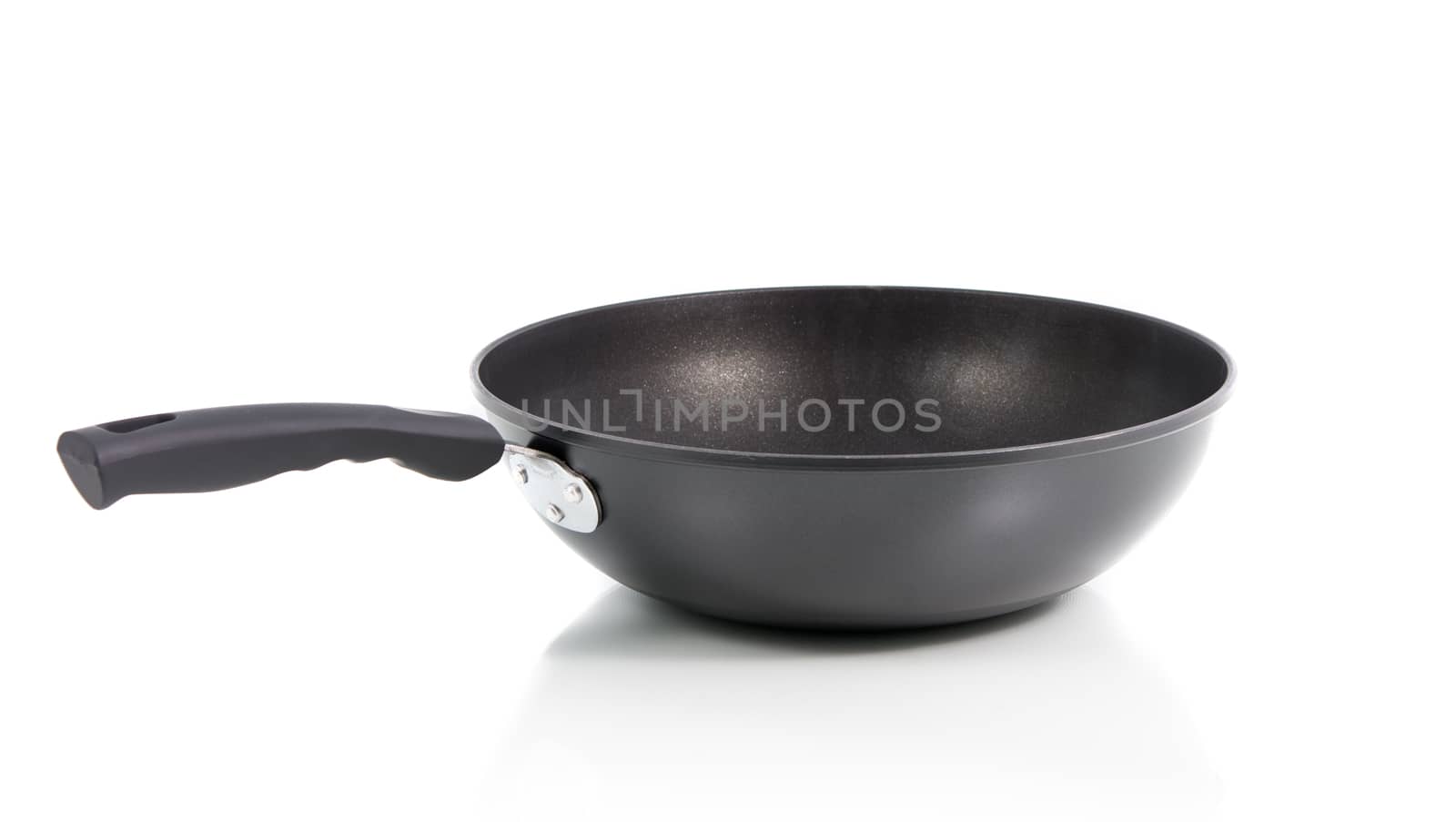 Closeup black frying pan isolated on over white background
