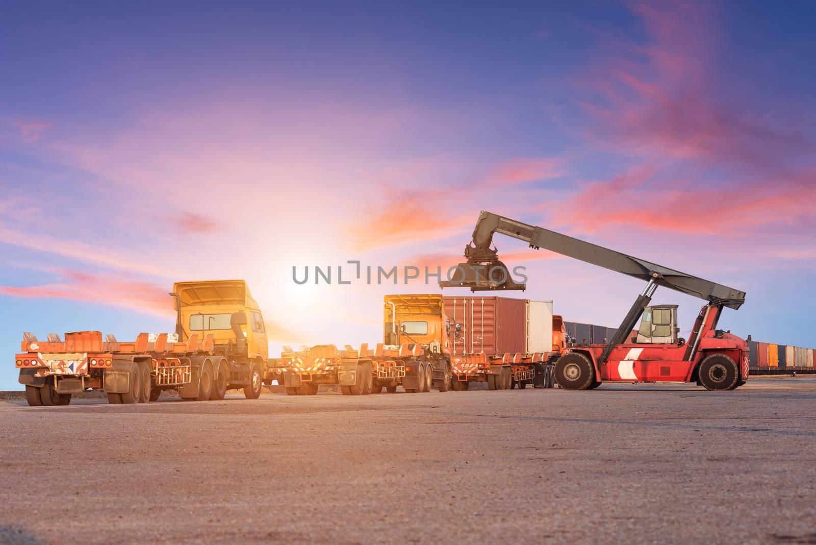 Forklift handling container box loading at the Docks with Truck