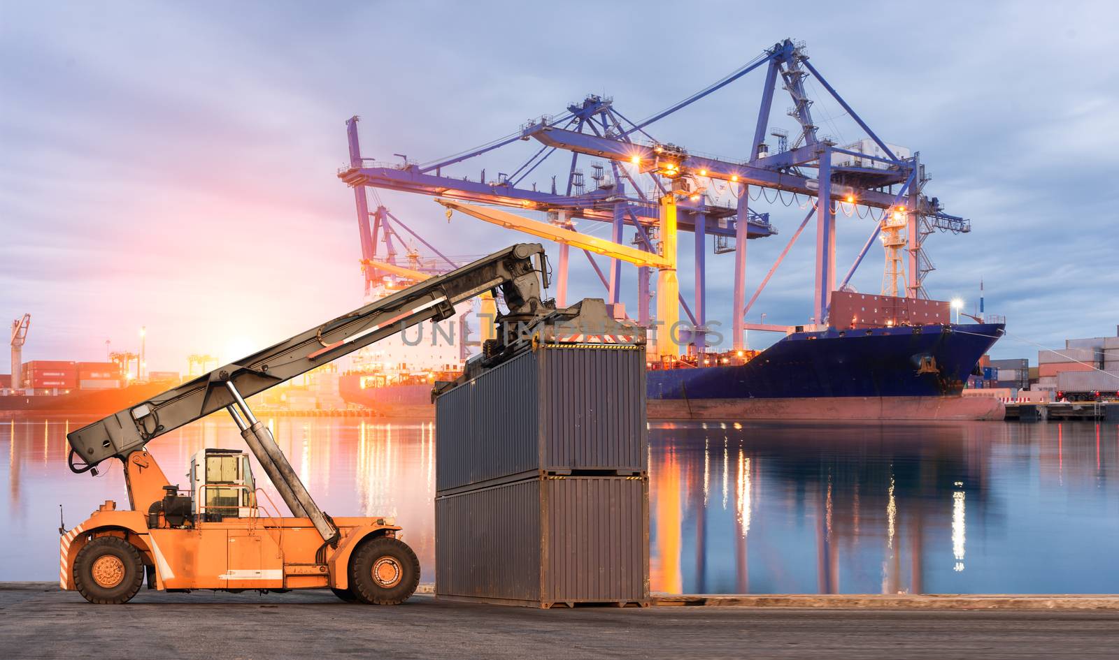 Forklift handling container box loading at port cargo