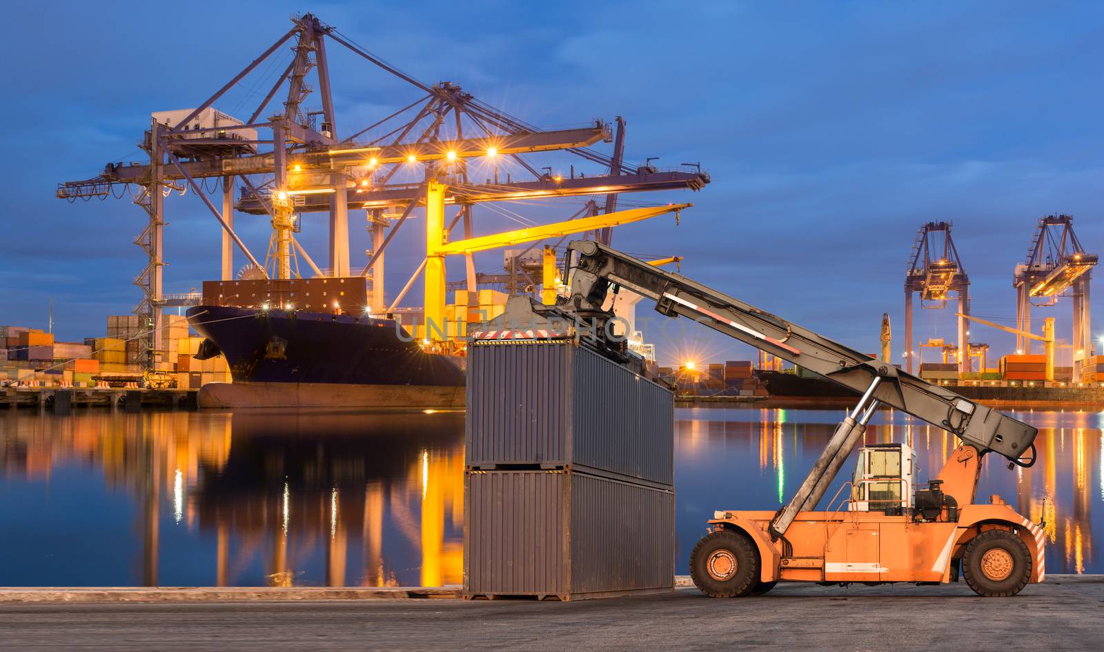 Forklift handling container box loading at port cargo