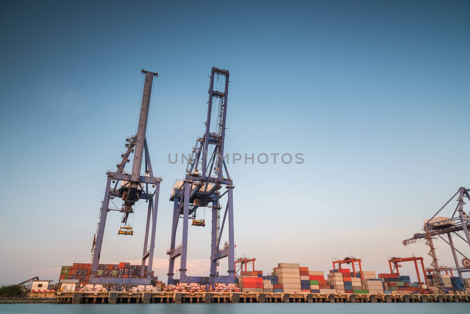 Cargo or Trade Shipping Port at sunrise