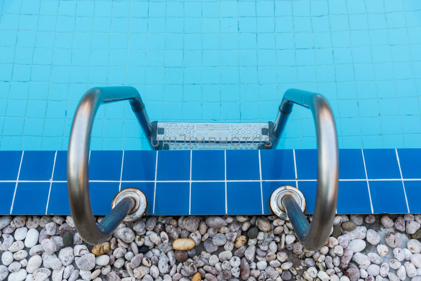 Hotel blue swimming pool by Sorapop