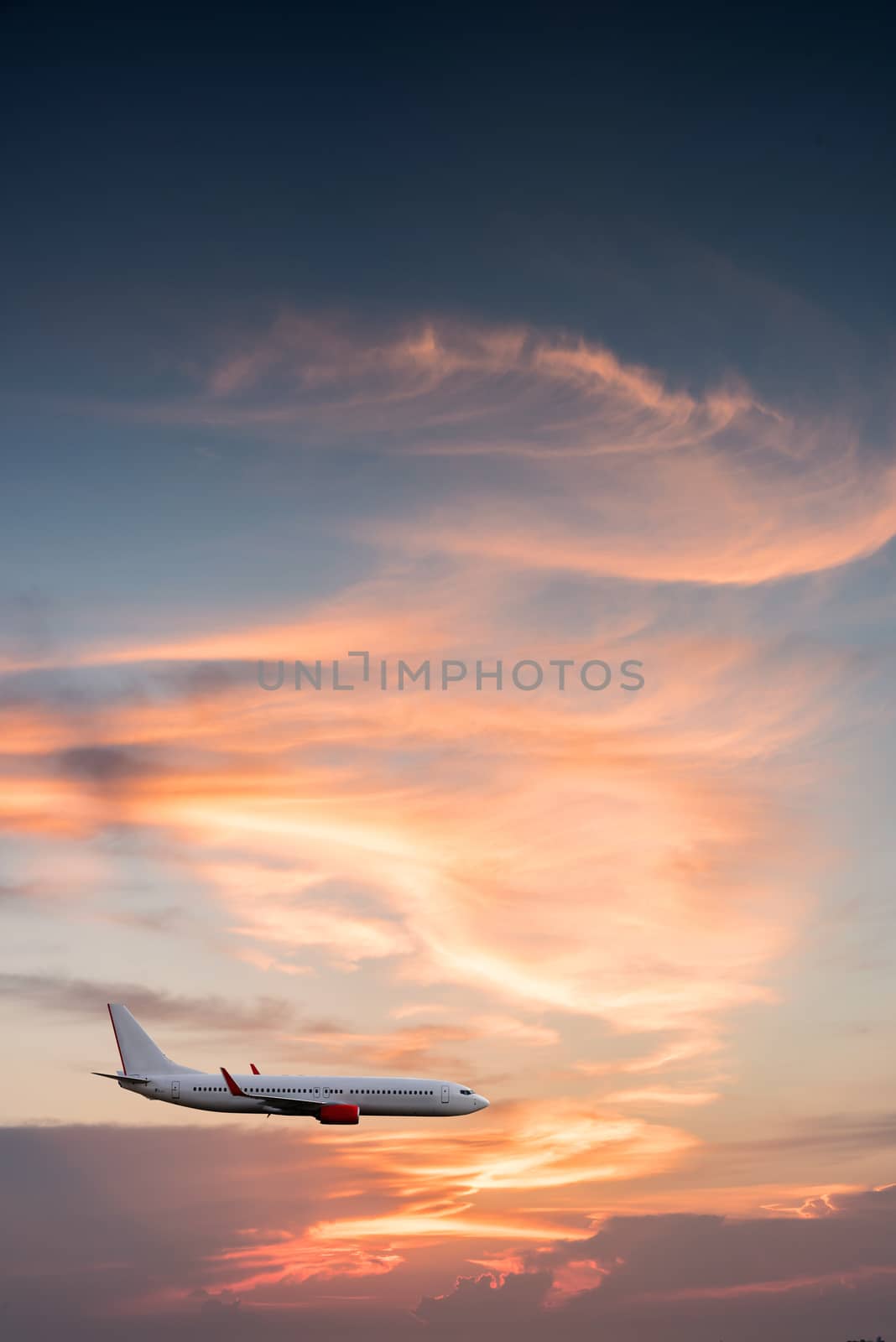 Airplane plane in the sky at sunset sky