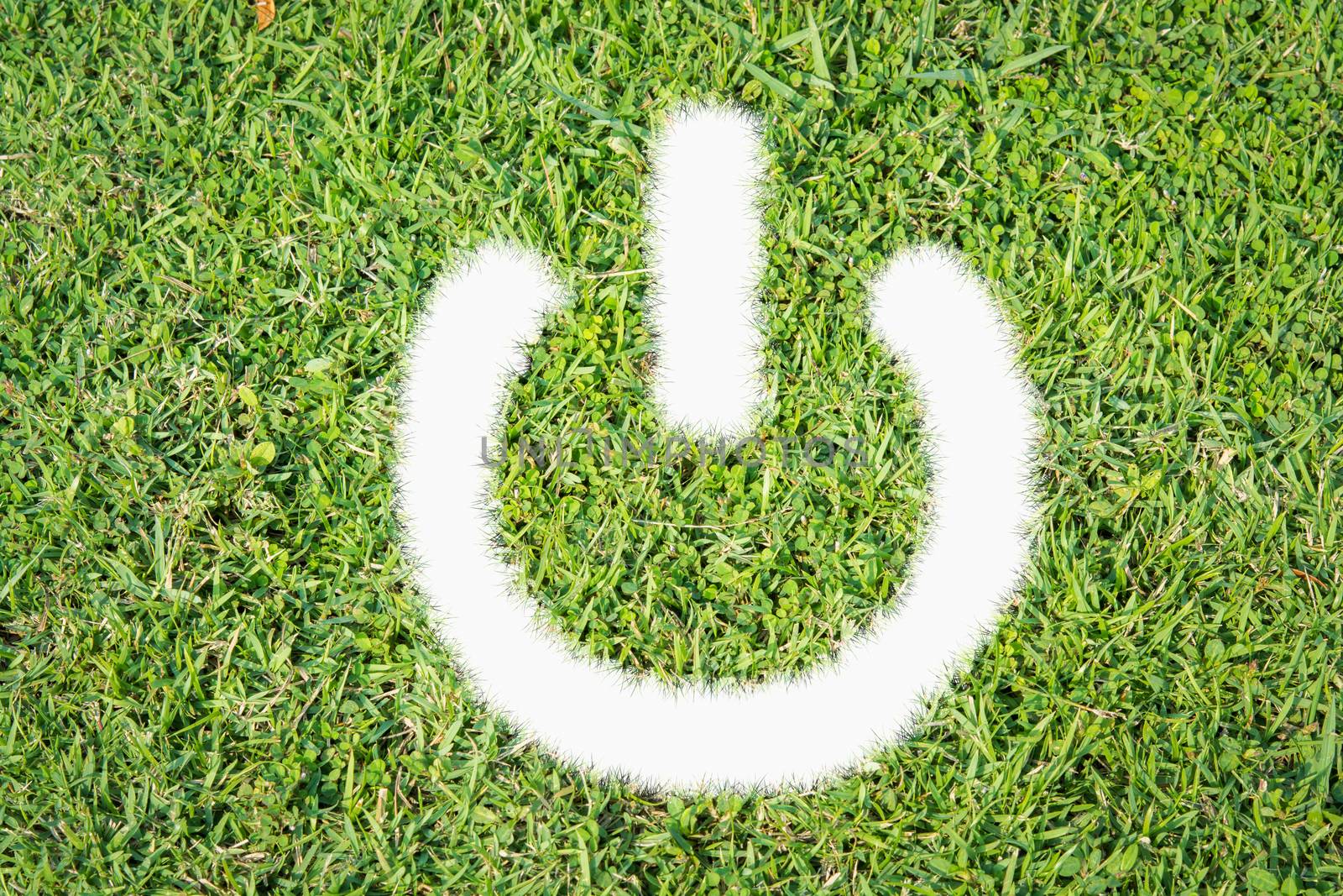 Green turf logo power switch on off made of green grass
