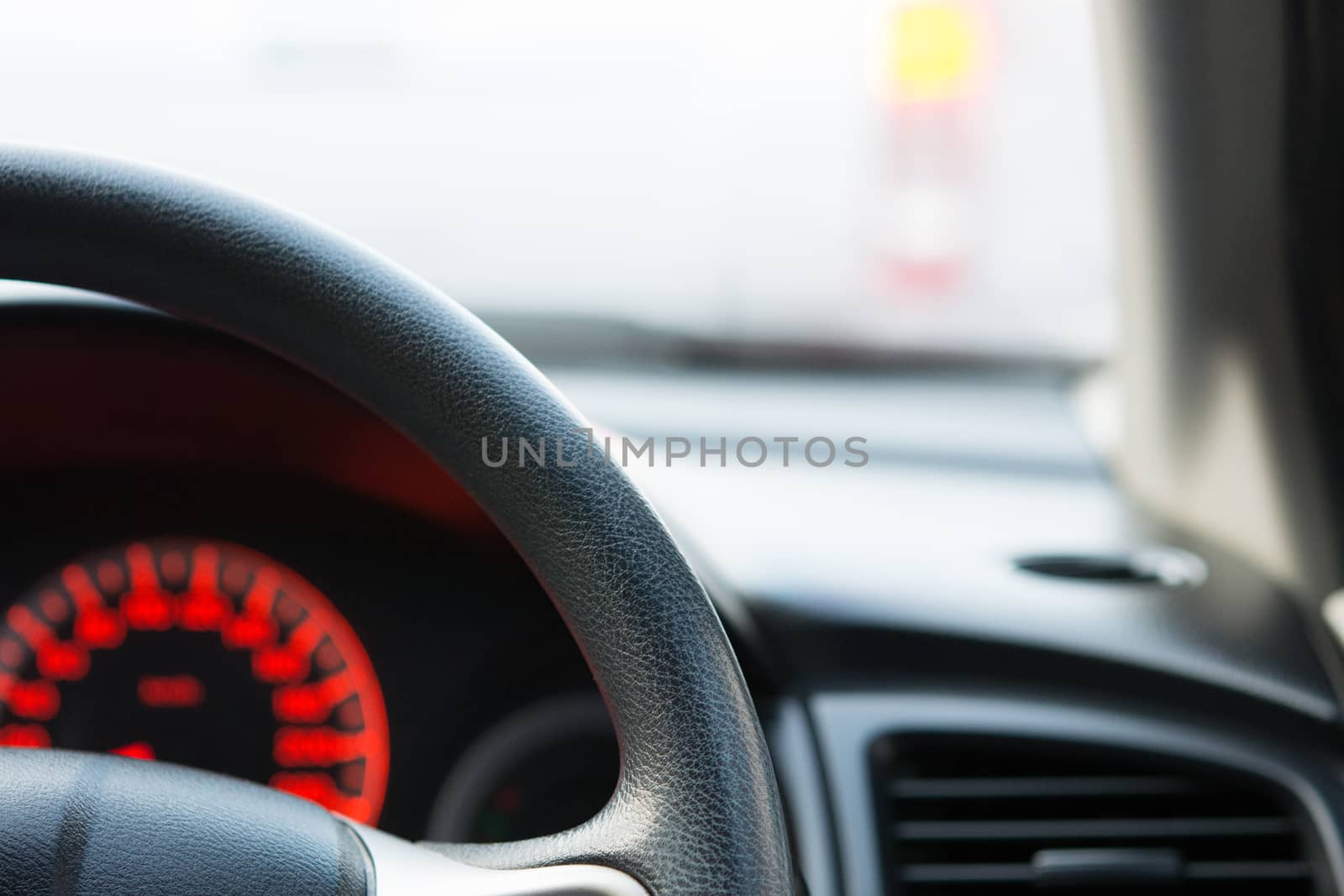 Generic photo of man driving in the car