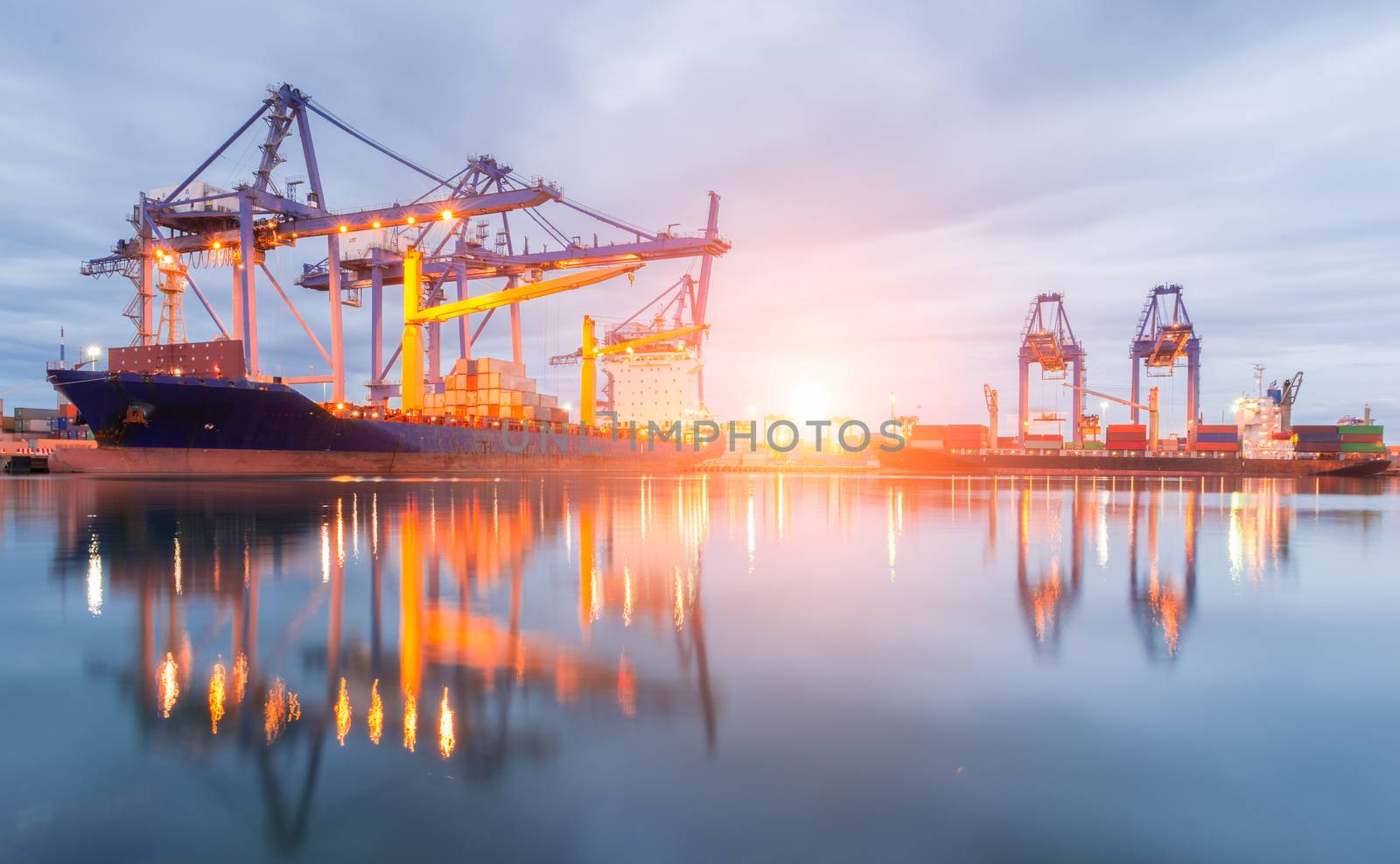 Containers loading Shipping by crane at morning or Trade Port