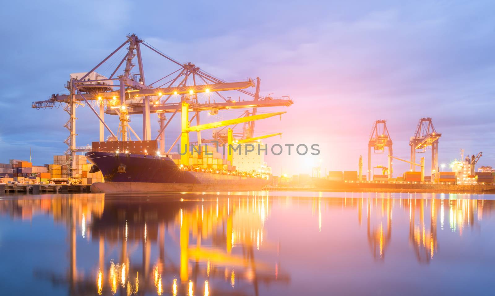 Containers loading by crane at dark sunset, Shipping Trade Port