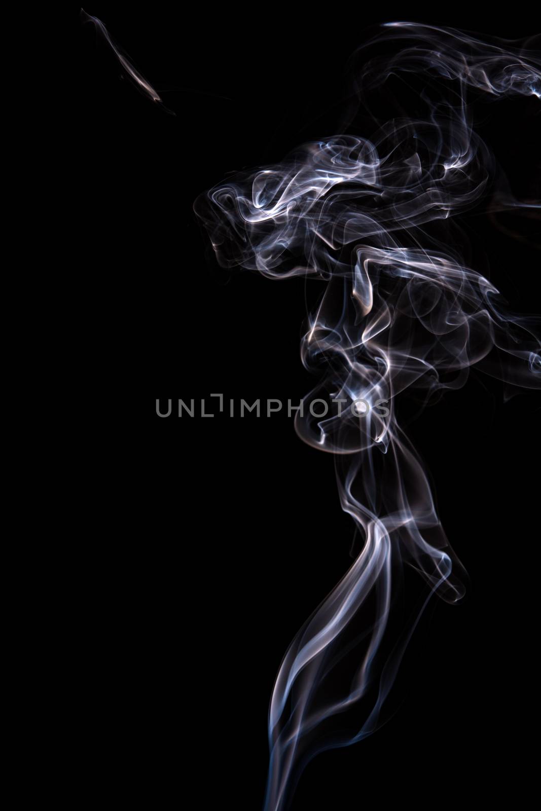 Abstract incense smoke isolated on black background