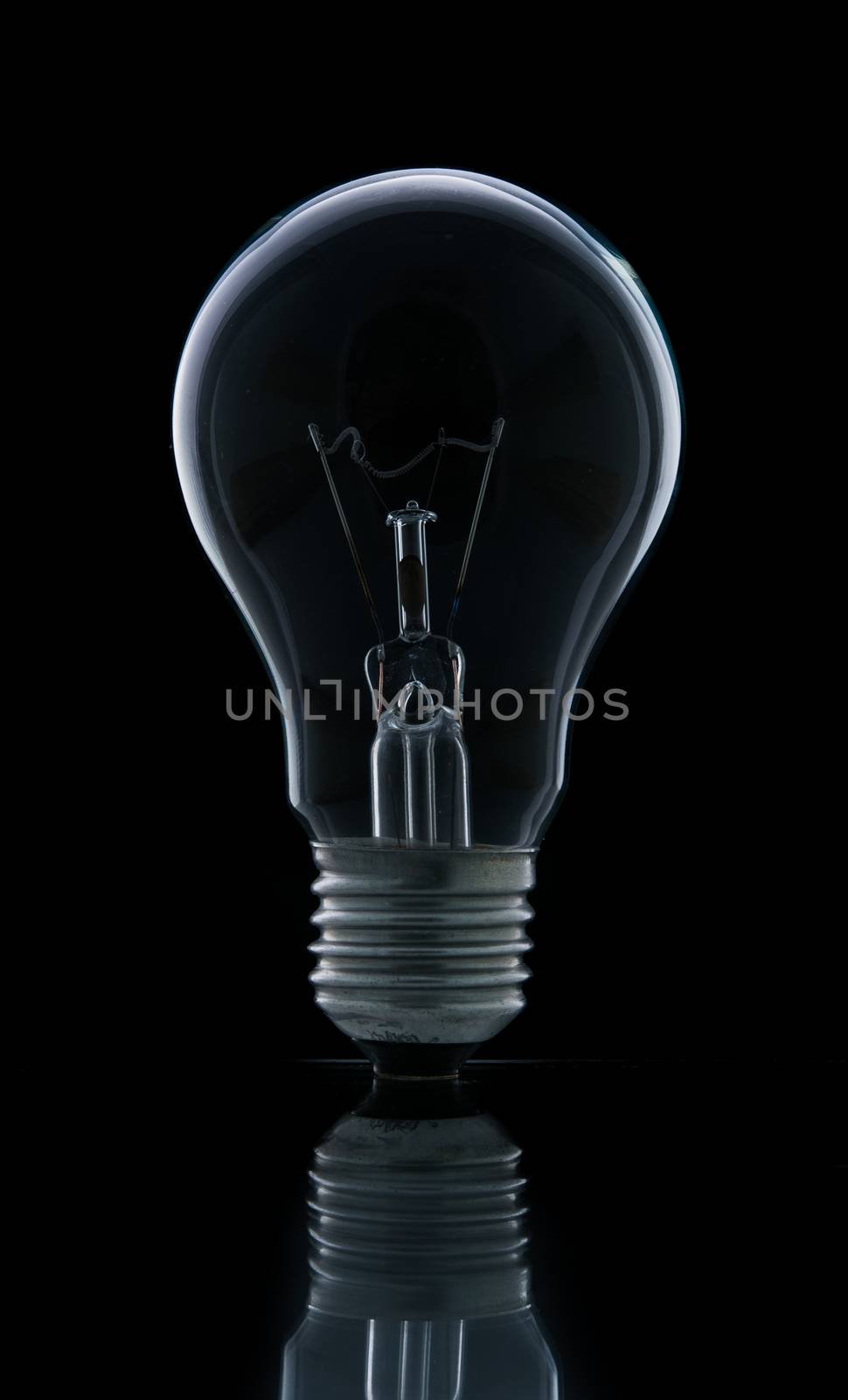 Lamp light bulb isolated on over black background