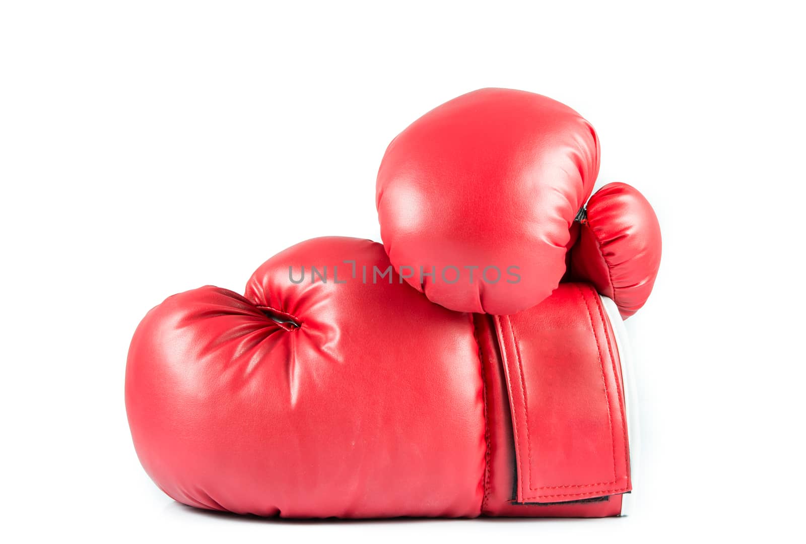 Pair of red leather boxing gloves isolated on over white background