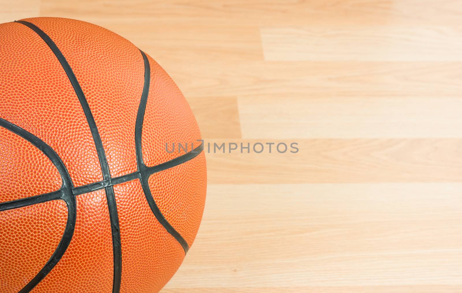 Close up Basketball on wooden floor background
