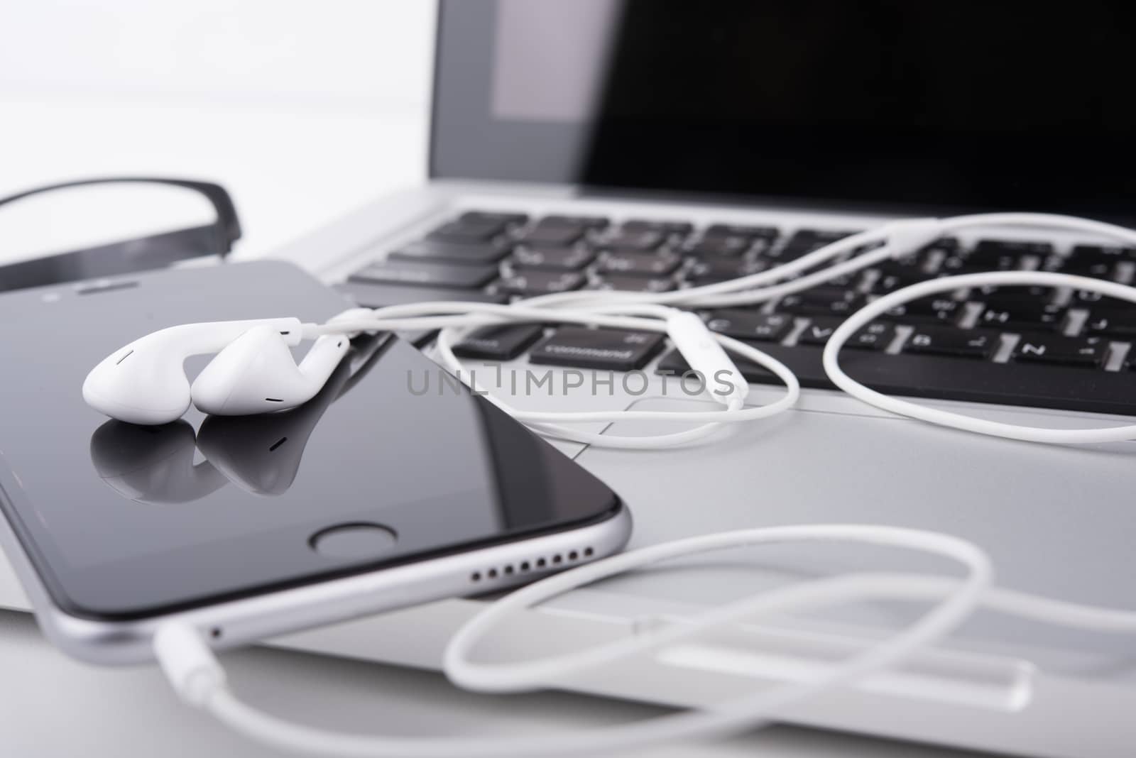 laptop,notebook and mobile phone, smartphone on office desk table.