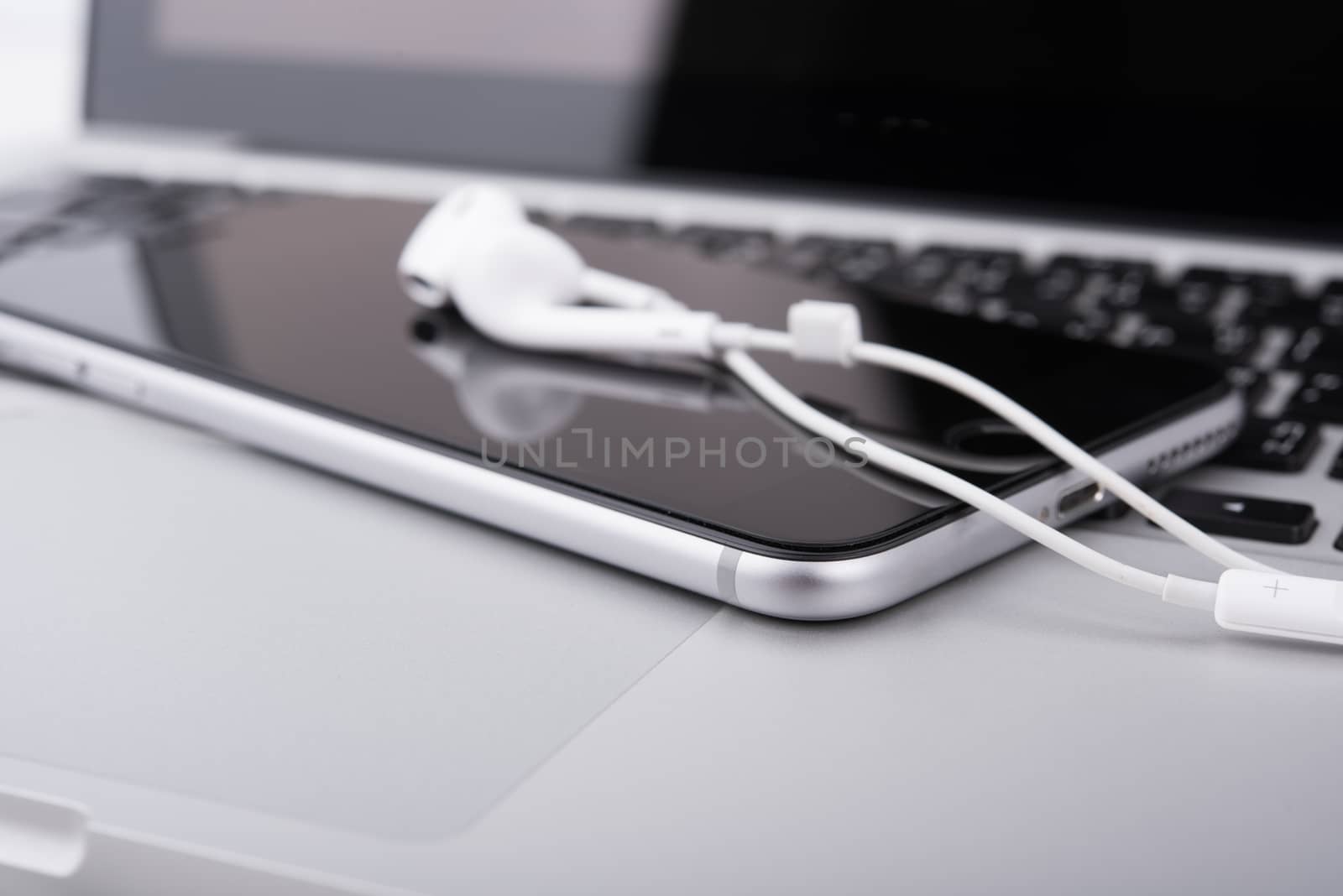 laptop,notebook and mobile phone, smartphone on office desk table.