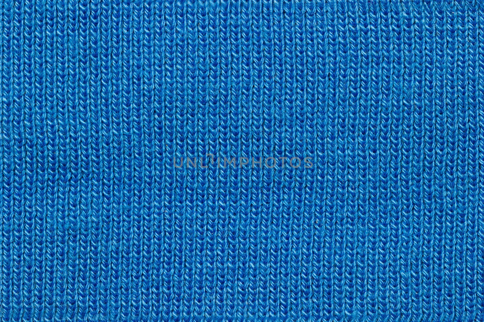 Texture of blue jacket fabric. Concept of clothes or fashion.