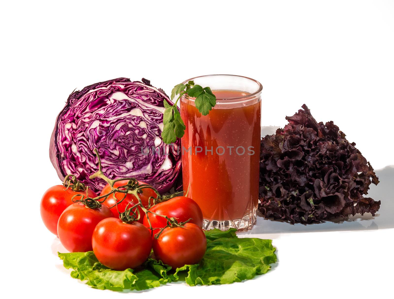 Fresh vegetables and a glass of juice by dmitry_derenyuk