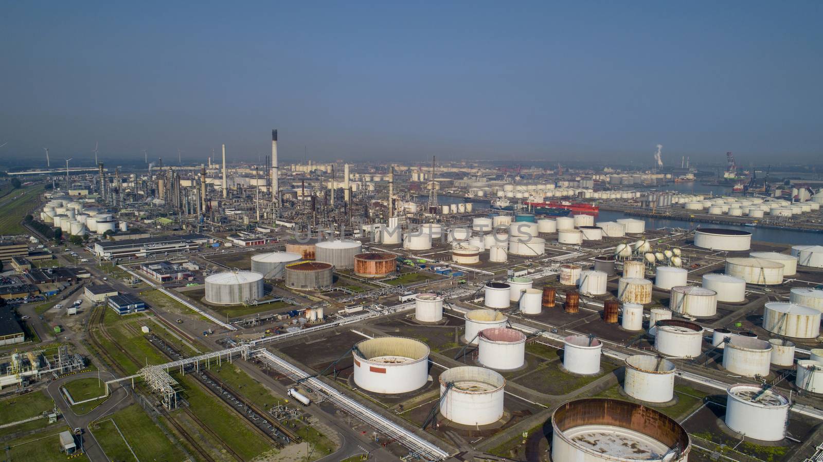 Port of Rotterdam. Botlek. Oil refinery plant from industry zone by Tjeerdkruse