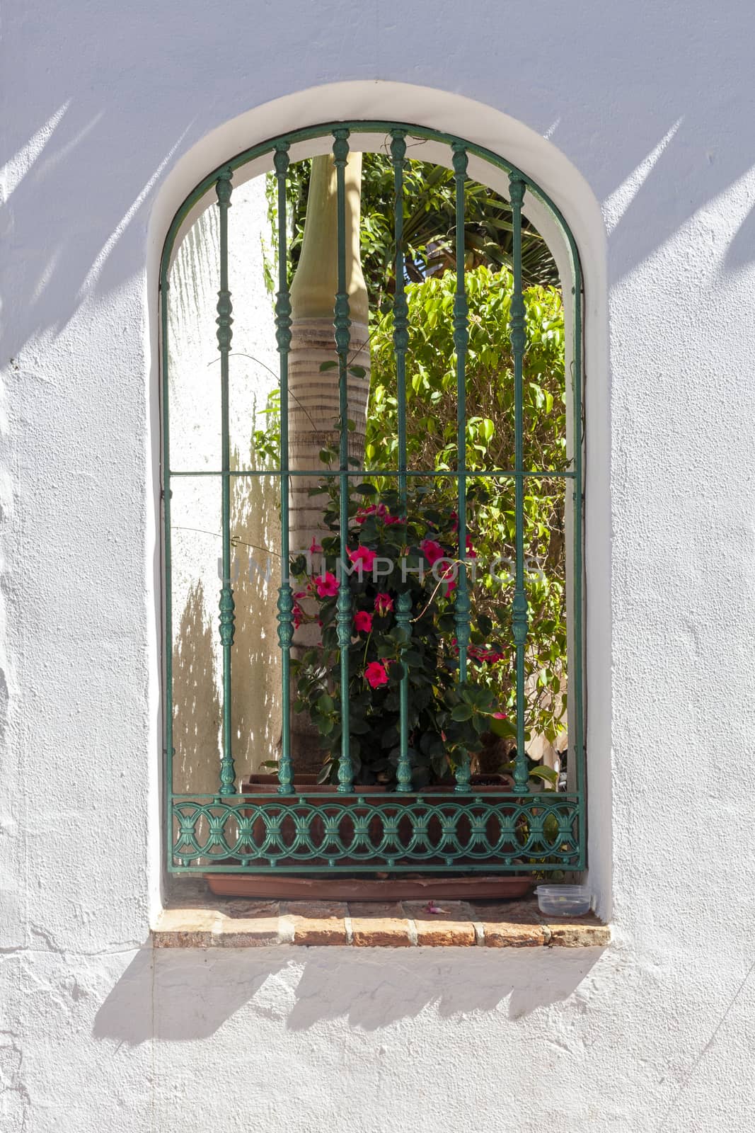 Vintage window on old traditional house in Andalusia, Spain
