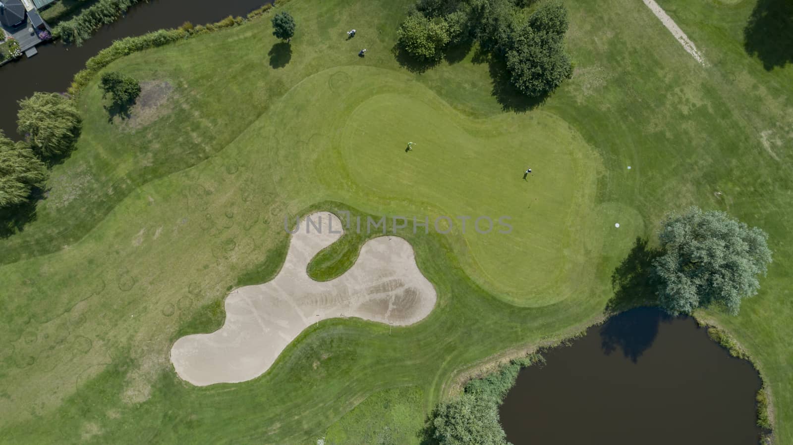 Aerial view from a Golf course with a rich green turf beautiful scenery