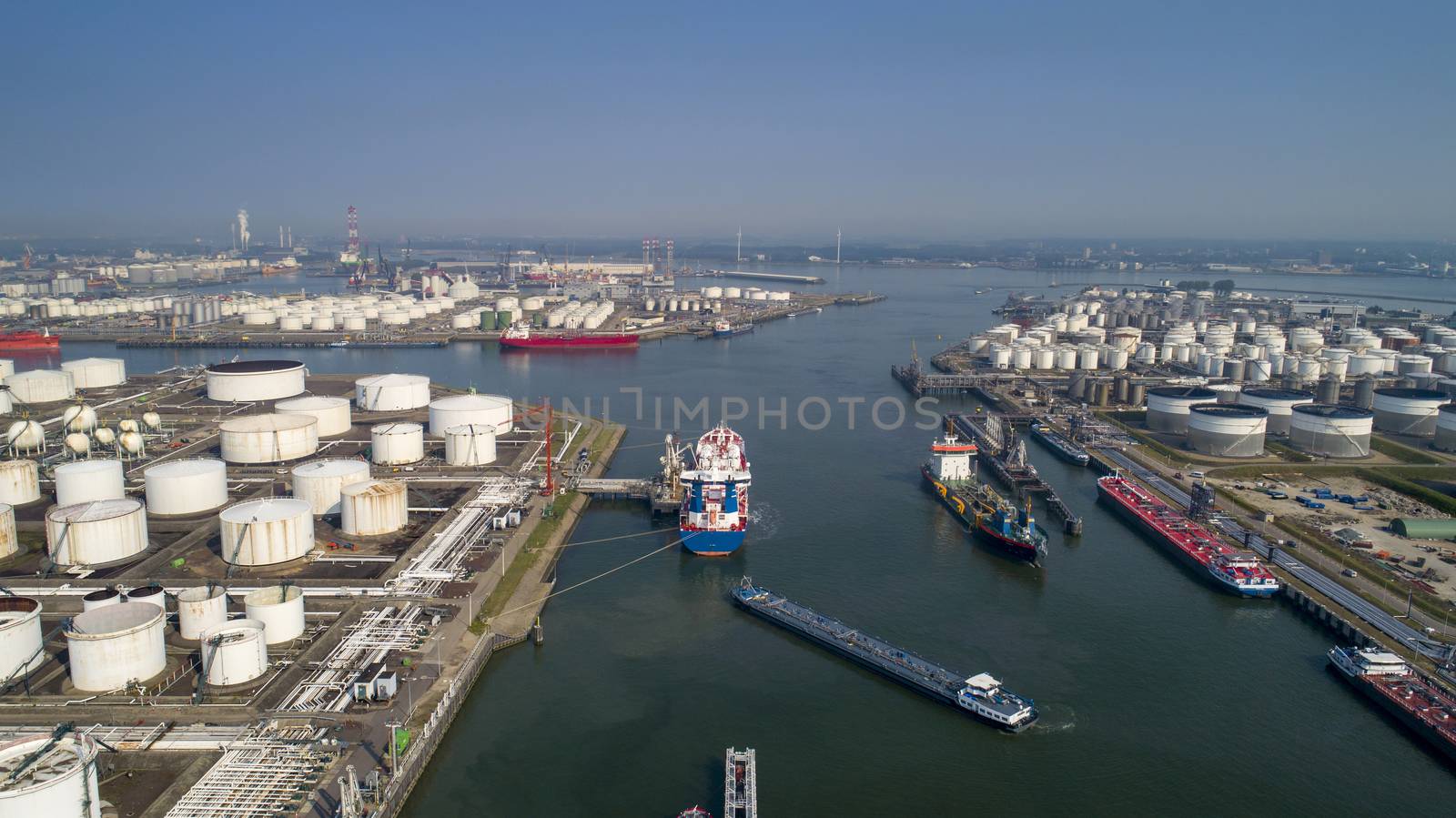Port of Rotterdam. Botlek. Oil refinery plant from industry zone by Tjeerdkruse