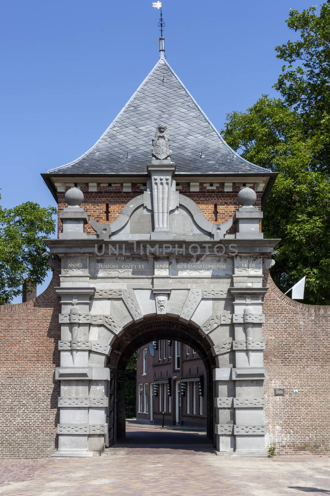 Medieval archway to the port of the picturesque village Schoonhoven near the river Lek in the Netherlands