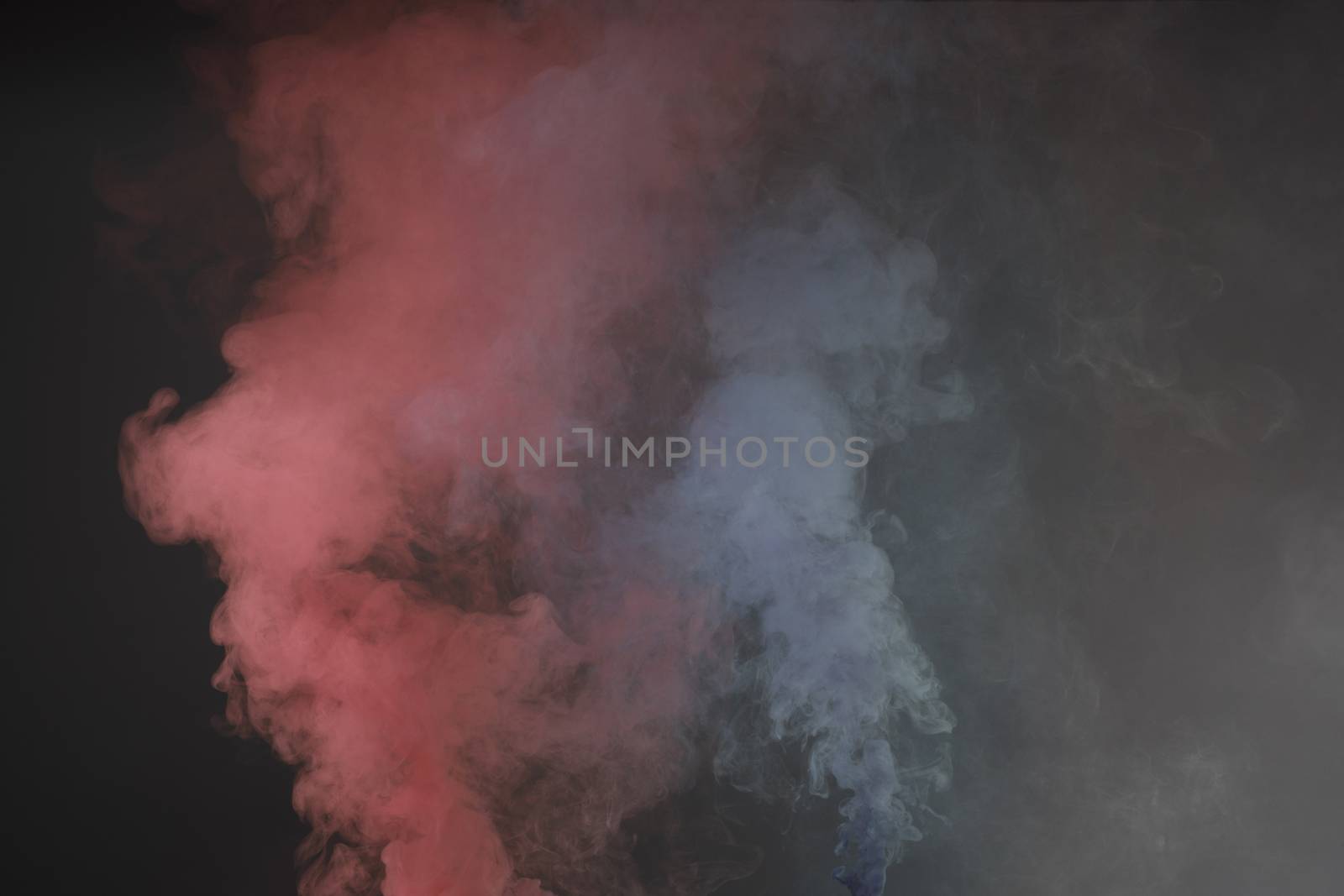 Big launched colorful powder, isolated on black background