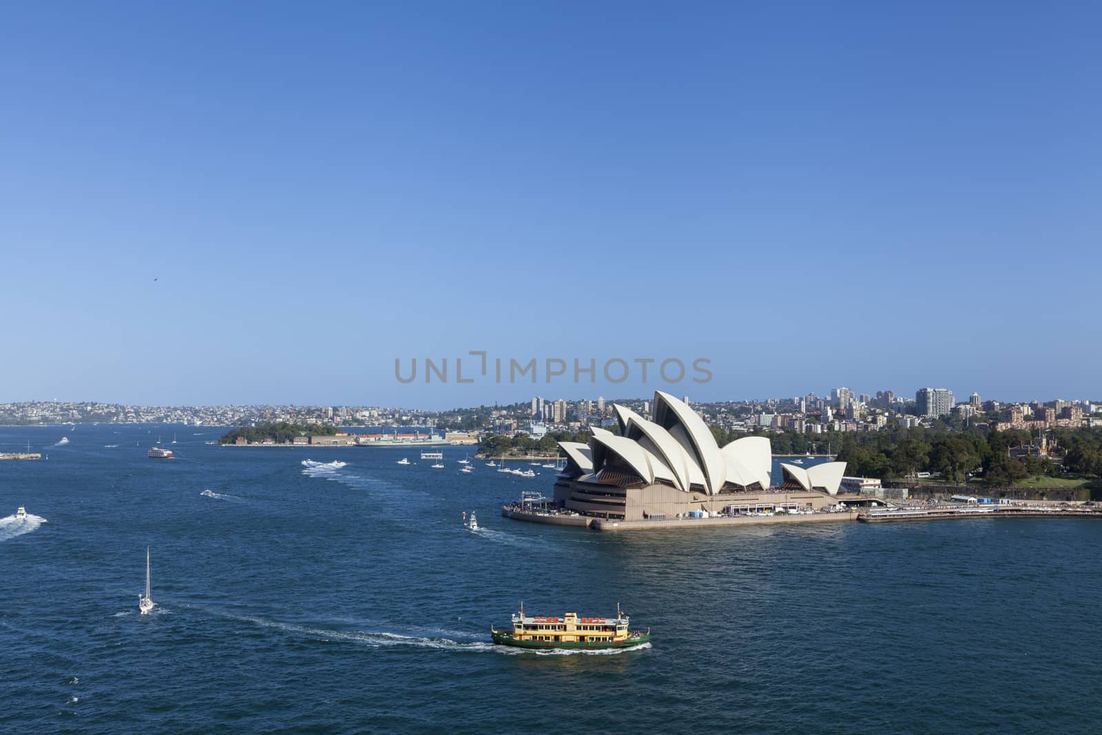 Australia Sydney CBD landmarks around Sydney Harbour view from Harbour Bridge lookout on a sunny summer day