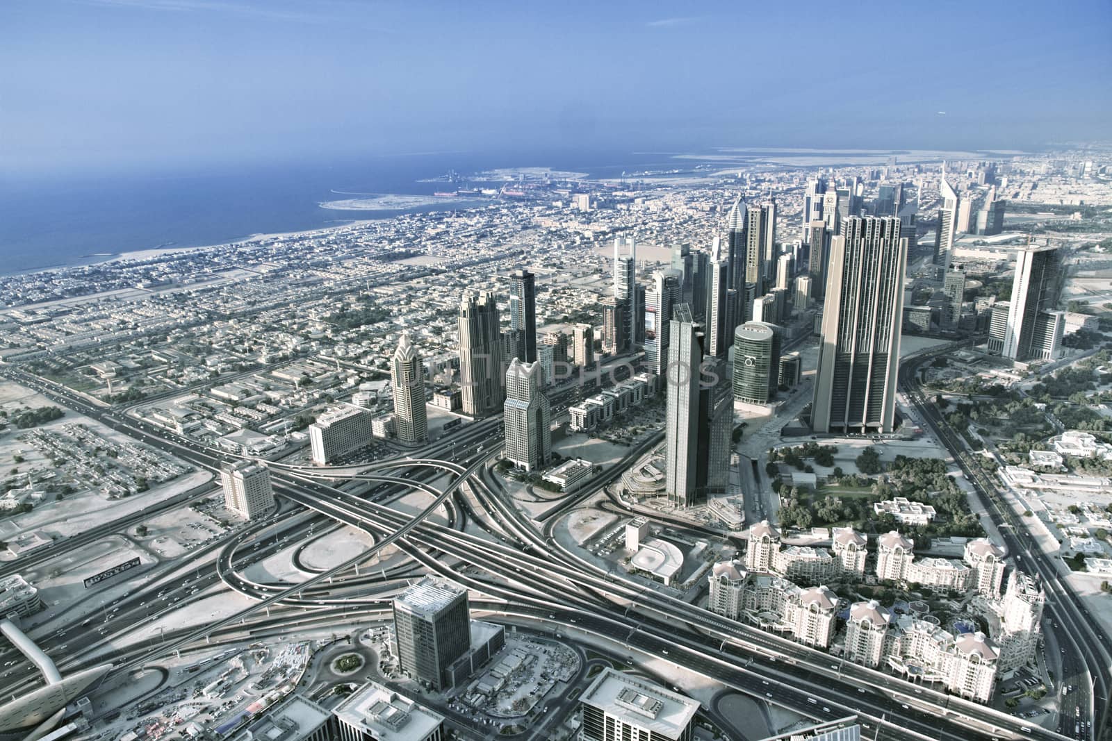 Dubai skyline with busiest highway by Tjeerdkruse
