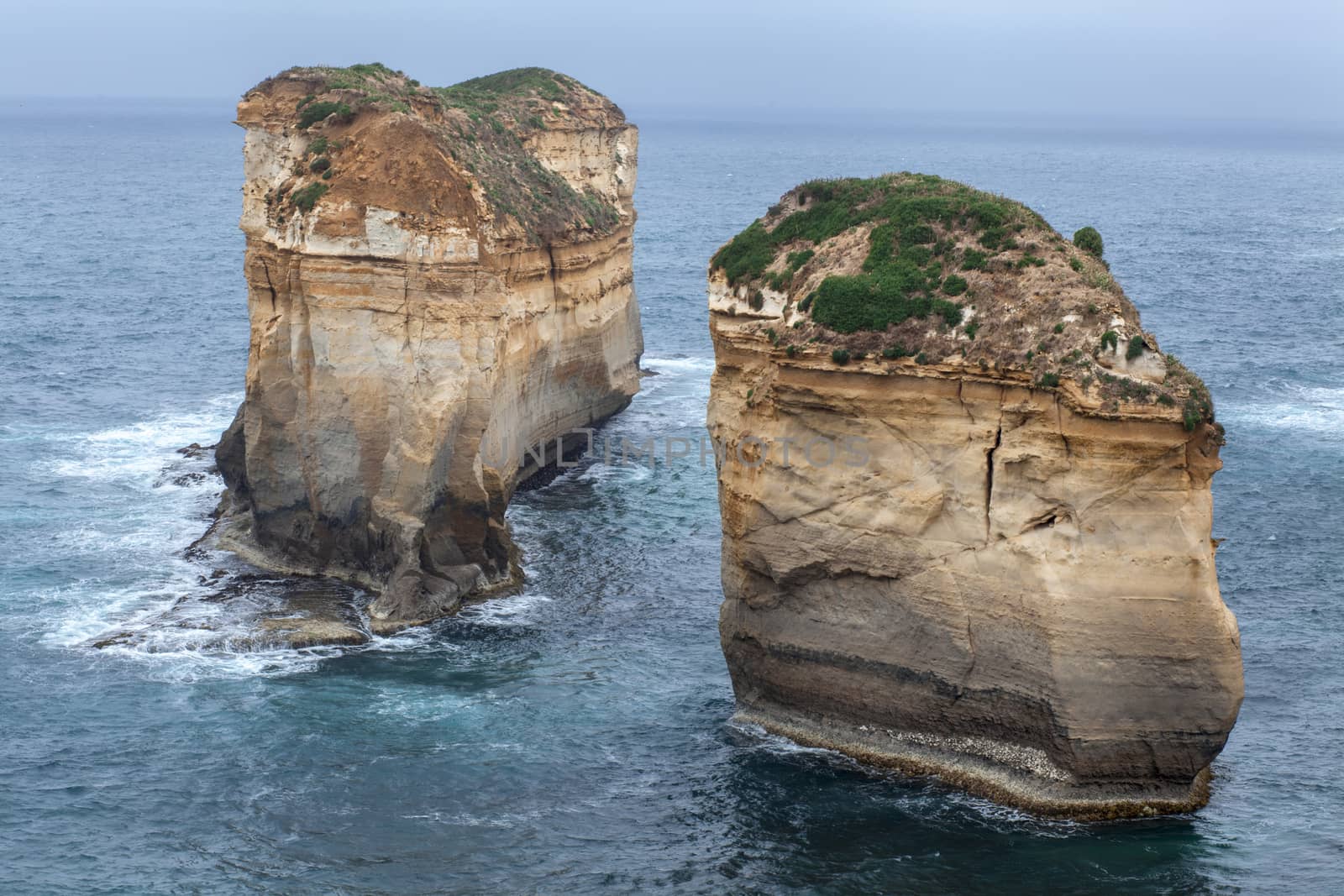 Twelve Apostles and orange cliffs along the Great Ocean Road in Australia - Image