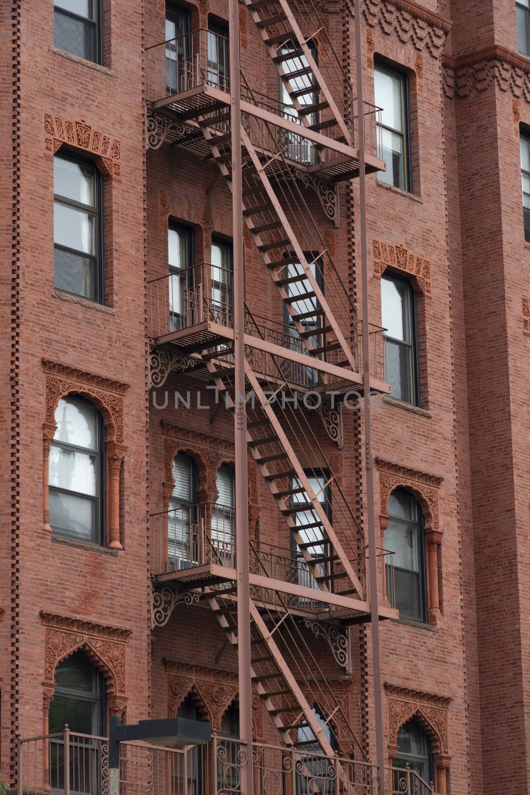 Fire escape stairs-downtown back alley architecture-steel by Tjeerdkruse