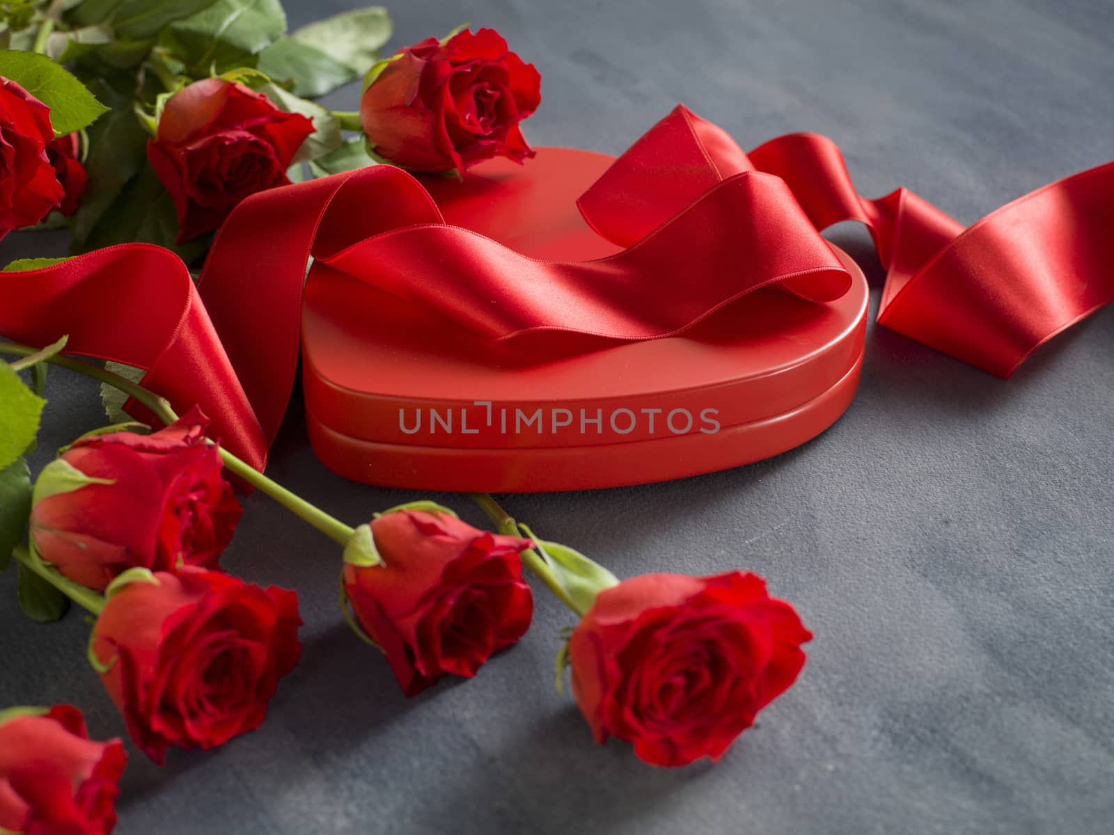 Valentine's Day, Gift box of kraft paper with a red ribbon and candles. Rustic style - Image