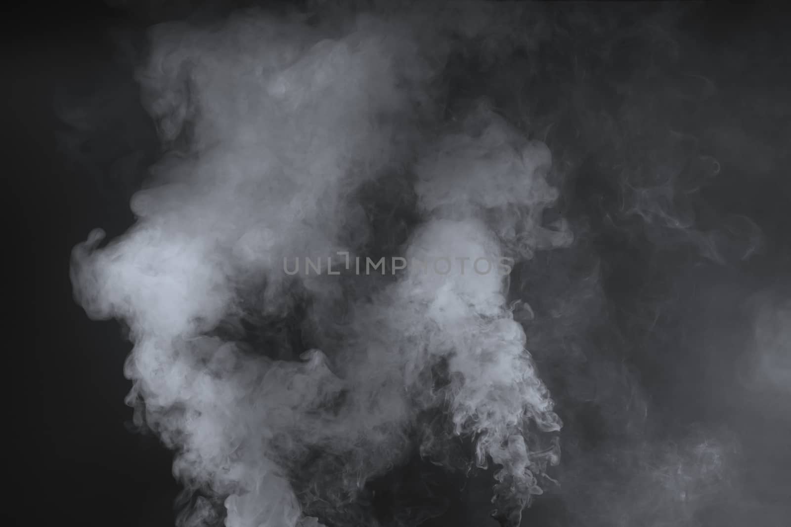Big launched white smoke, isolated on a black background
