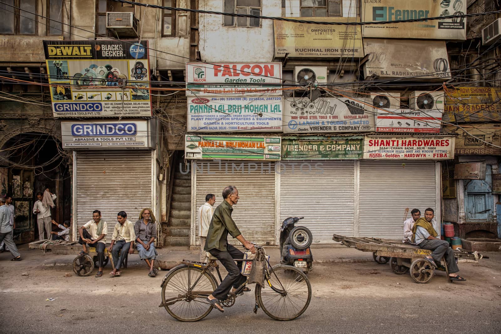 Busy Indian Street Market in New Delhi, India. Delhi's population surpassed 18 million people