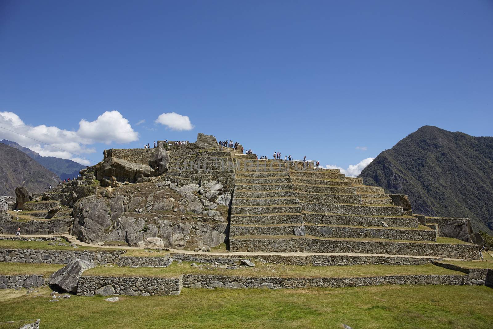 View of Machu Pichhu on a sunny afternoon by Tjeerdkruse