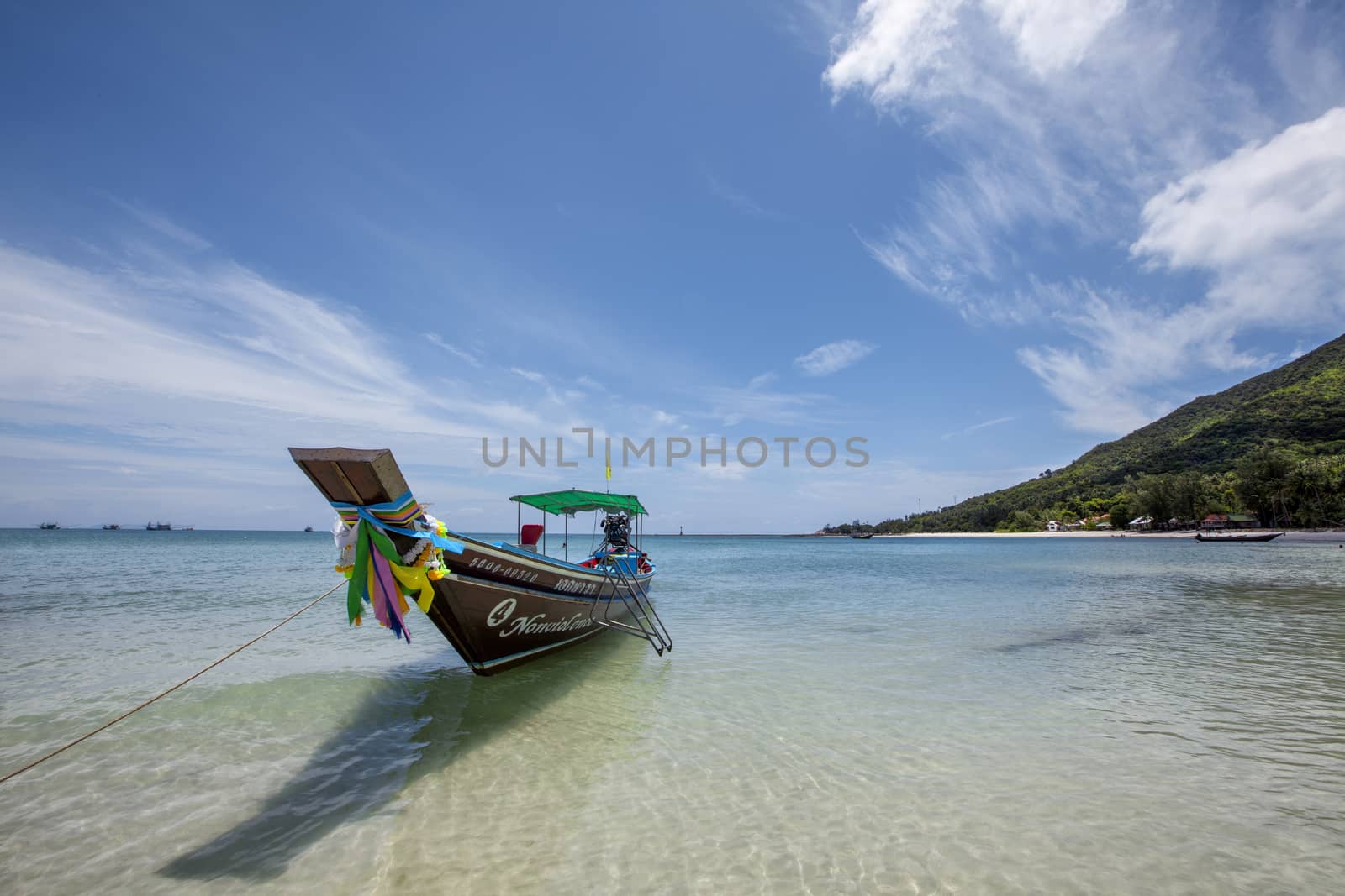 Tropical vacation holiday tourism beach concept - Long tail boat on tropical beach