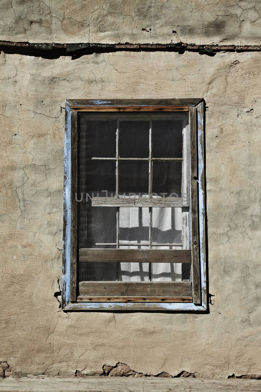 Window in Ancient Pueblo Sky City in Acoma by Tjeerdkruse