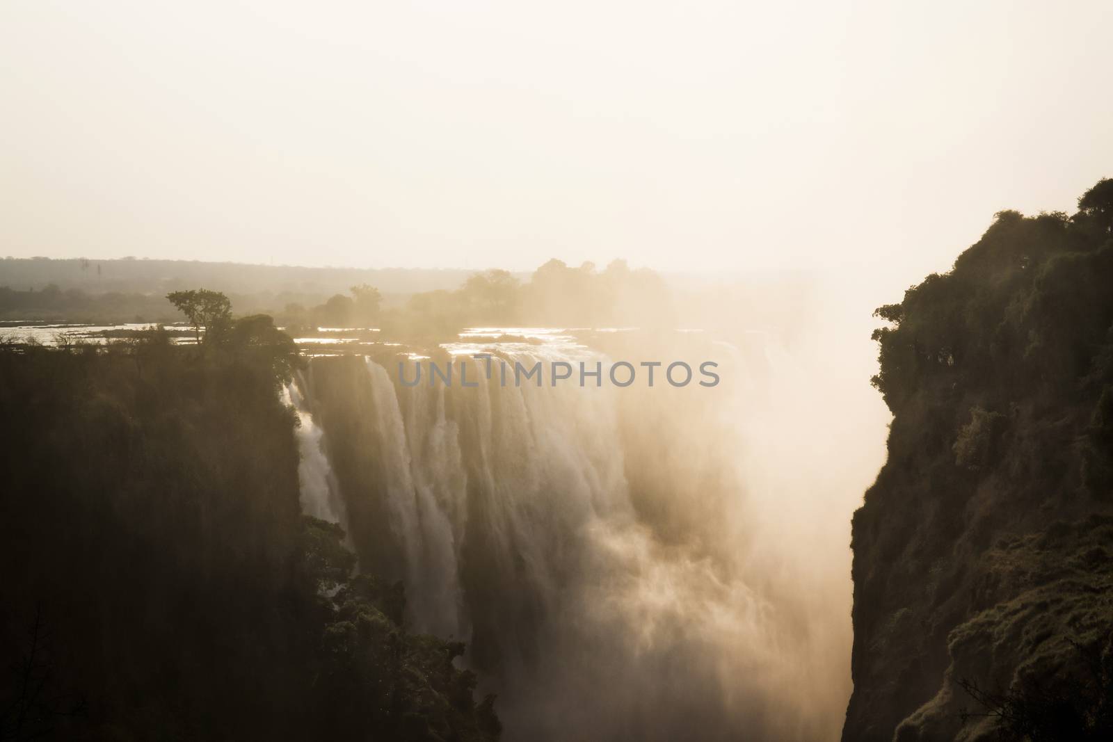 famous Victoria Falls on the Zambezi River in South Africa. At the end of the rainy season, the waterfall most high water