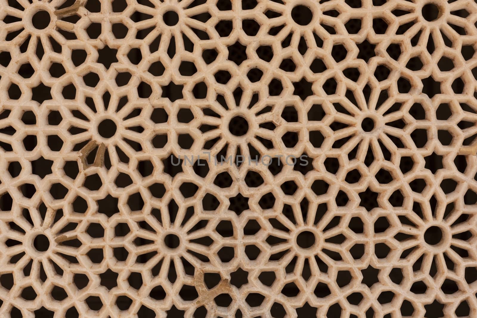 Perforated wall in the building of the palace in the Amber Fort, Jaipur, Rajasthan State, India