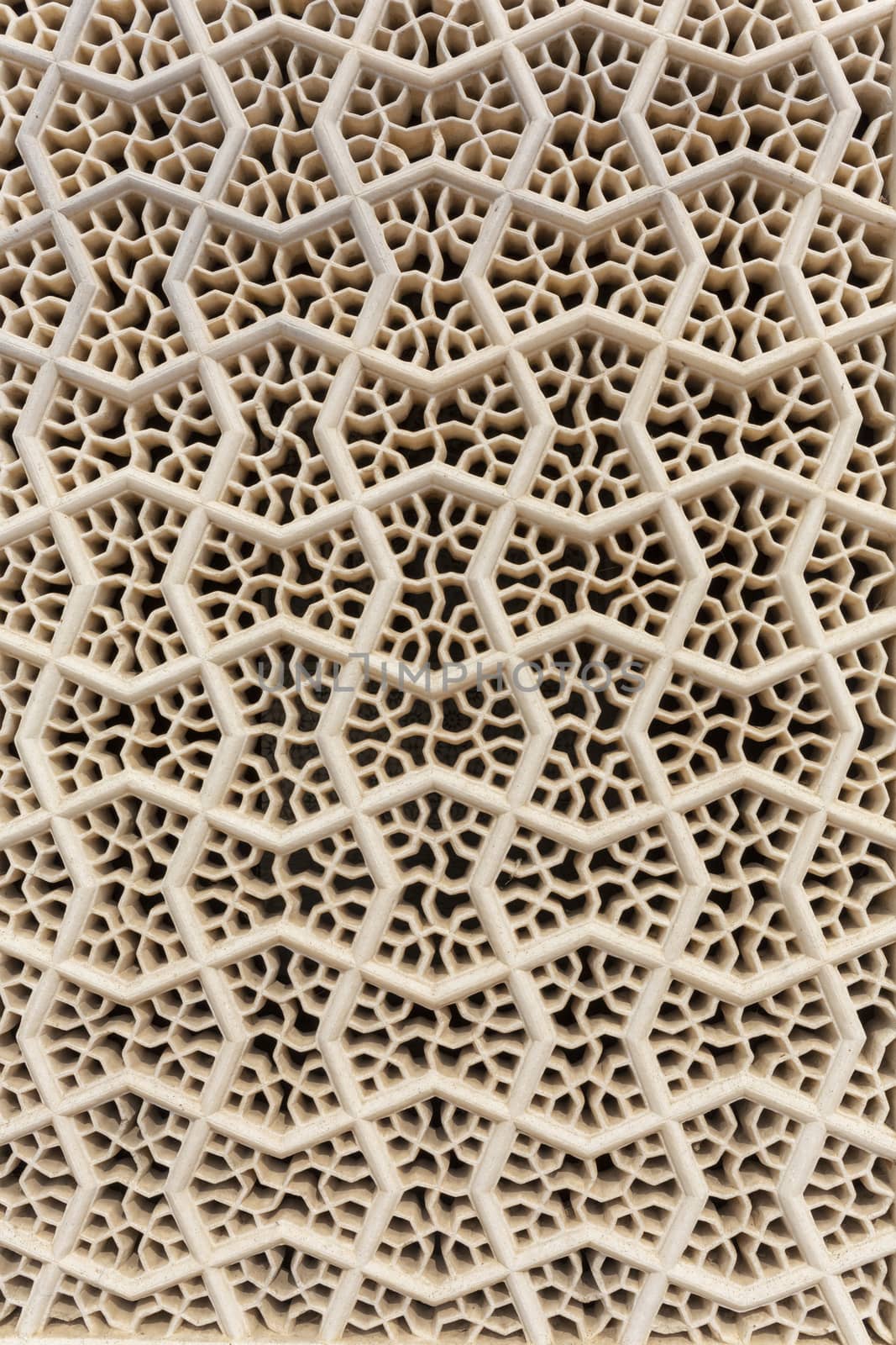 Perforated wall in the building of the palace in the Amber Fort, Jaipur, India